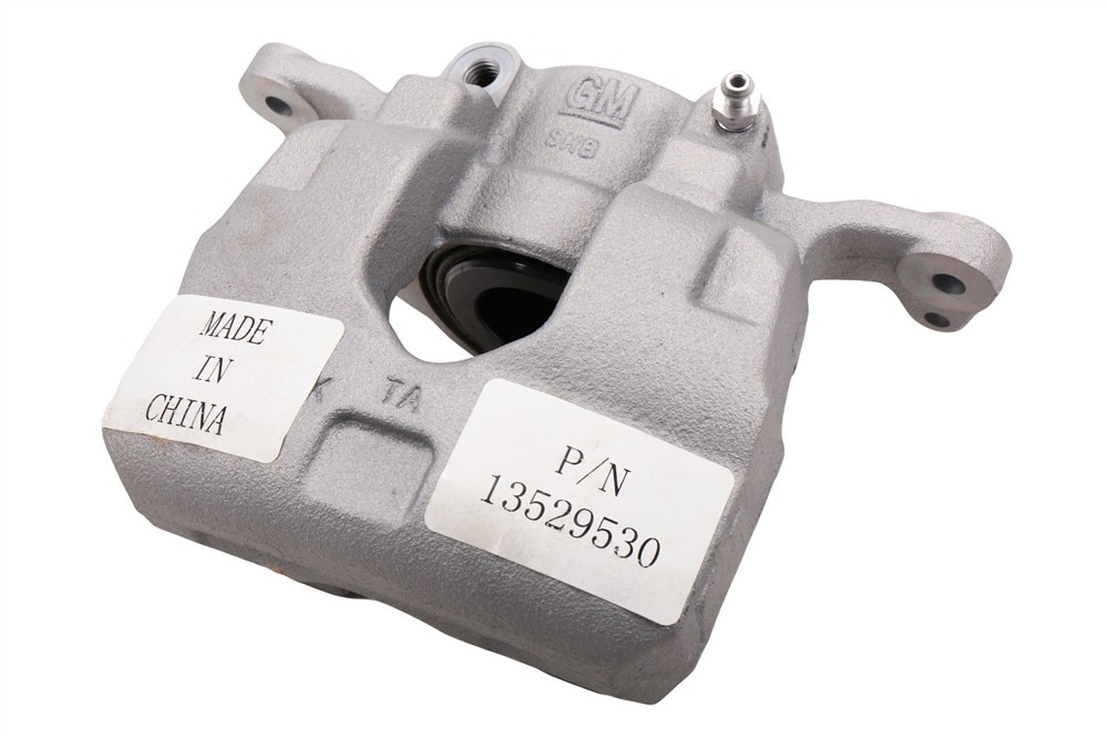 GM Genuine Parts Front Driver Side Disc Brake Caliper Assembly