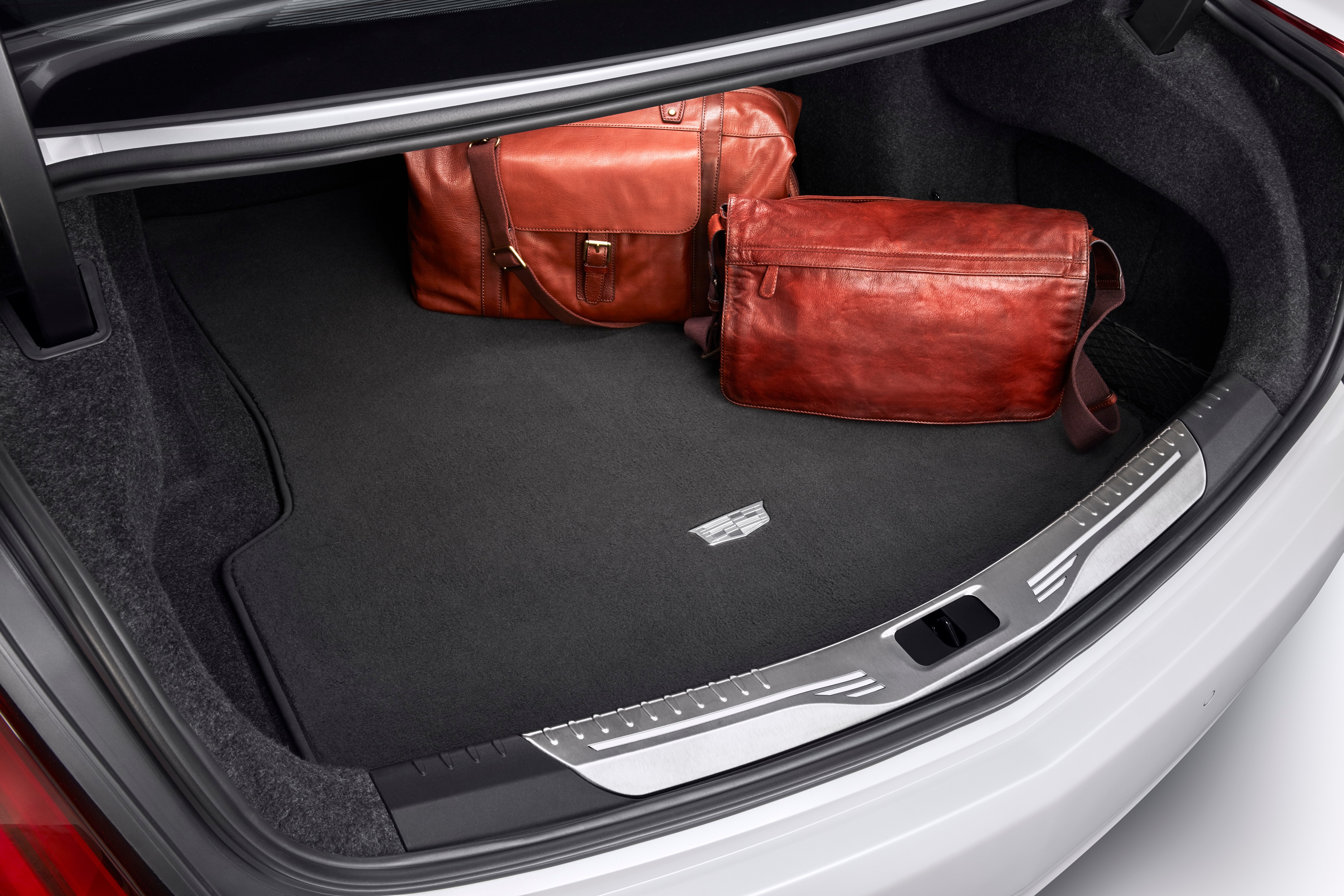 Premium Carpeted Cargo Area Mat in Jet Black with Cadillac Logo