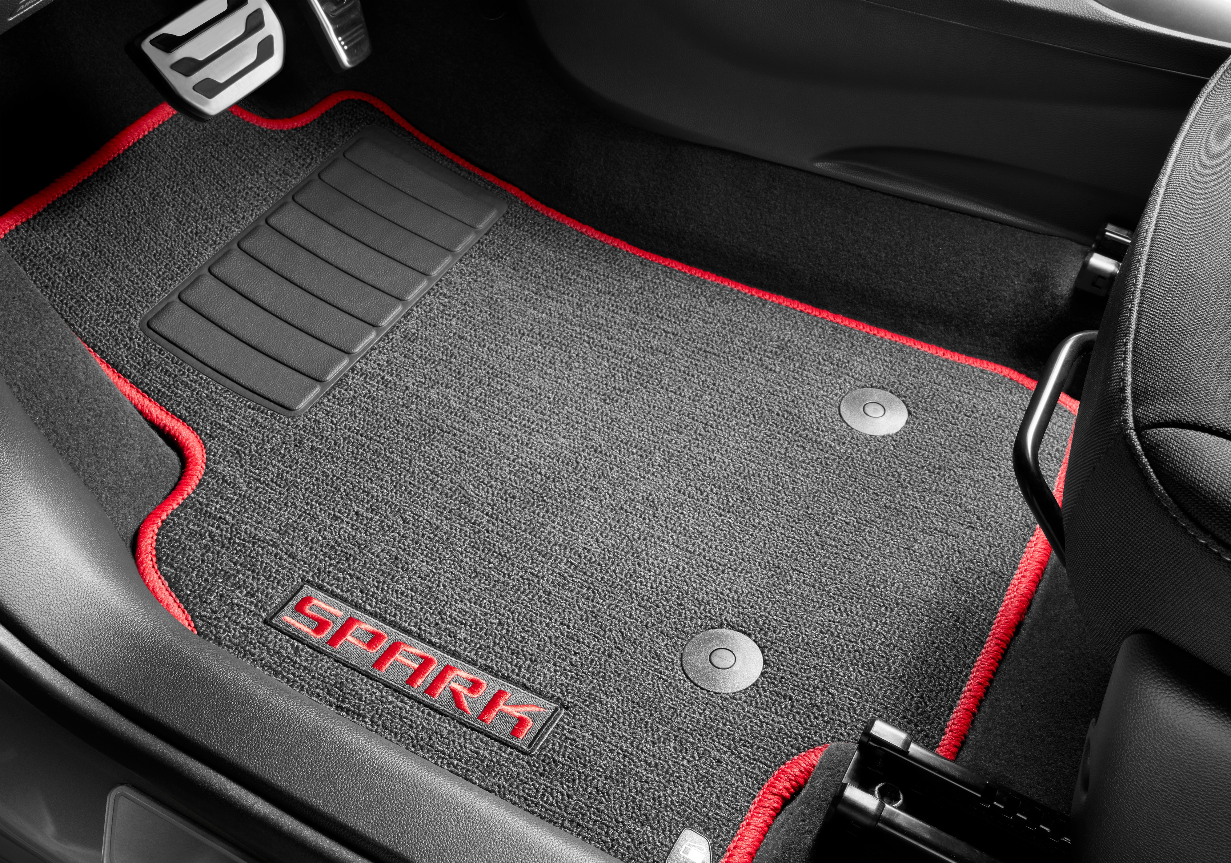 First- and Second-Row Premium Carpeted Floor Mats in Jet Black with Racer Red Stitching and Spark Script