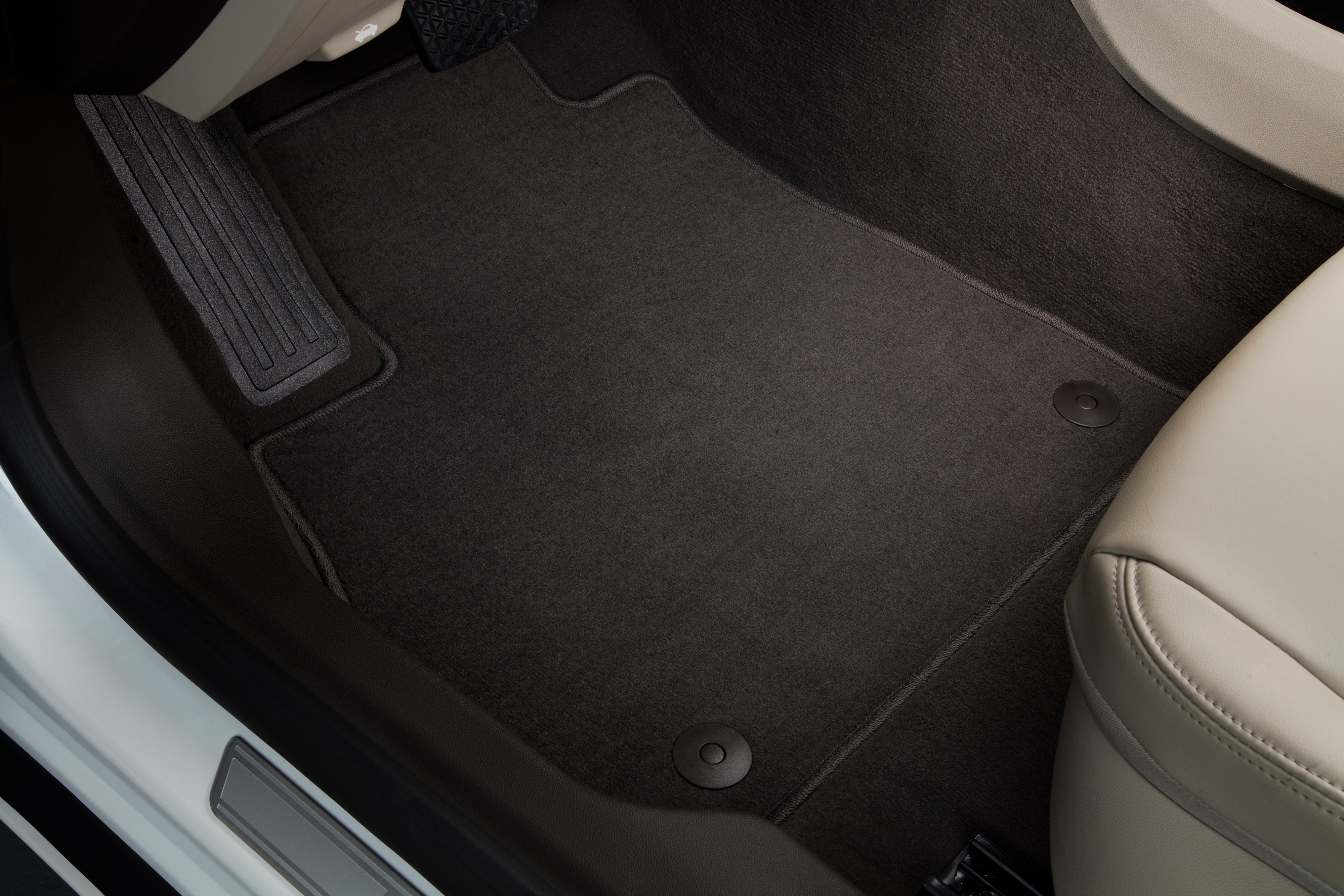 First- and Second-Row Carpeted Floor Mats in Very Dark Atmosphere