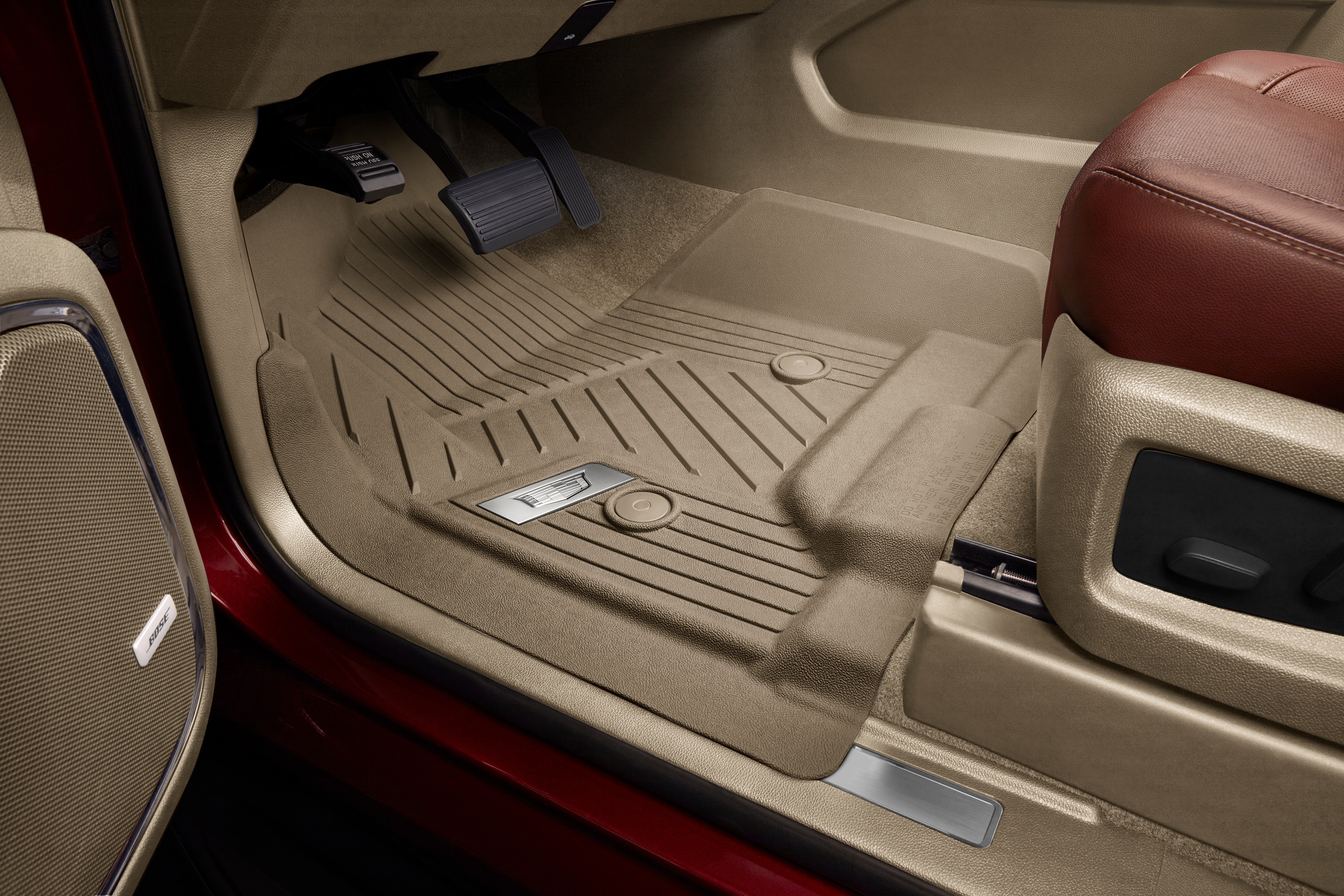 First-Row Premium All-Weather Floor Liners in Dune with Chrome Cadillac Logo