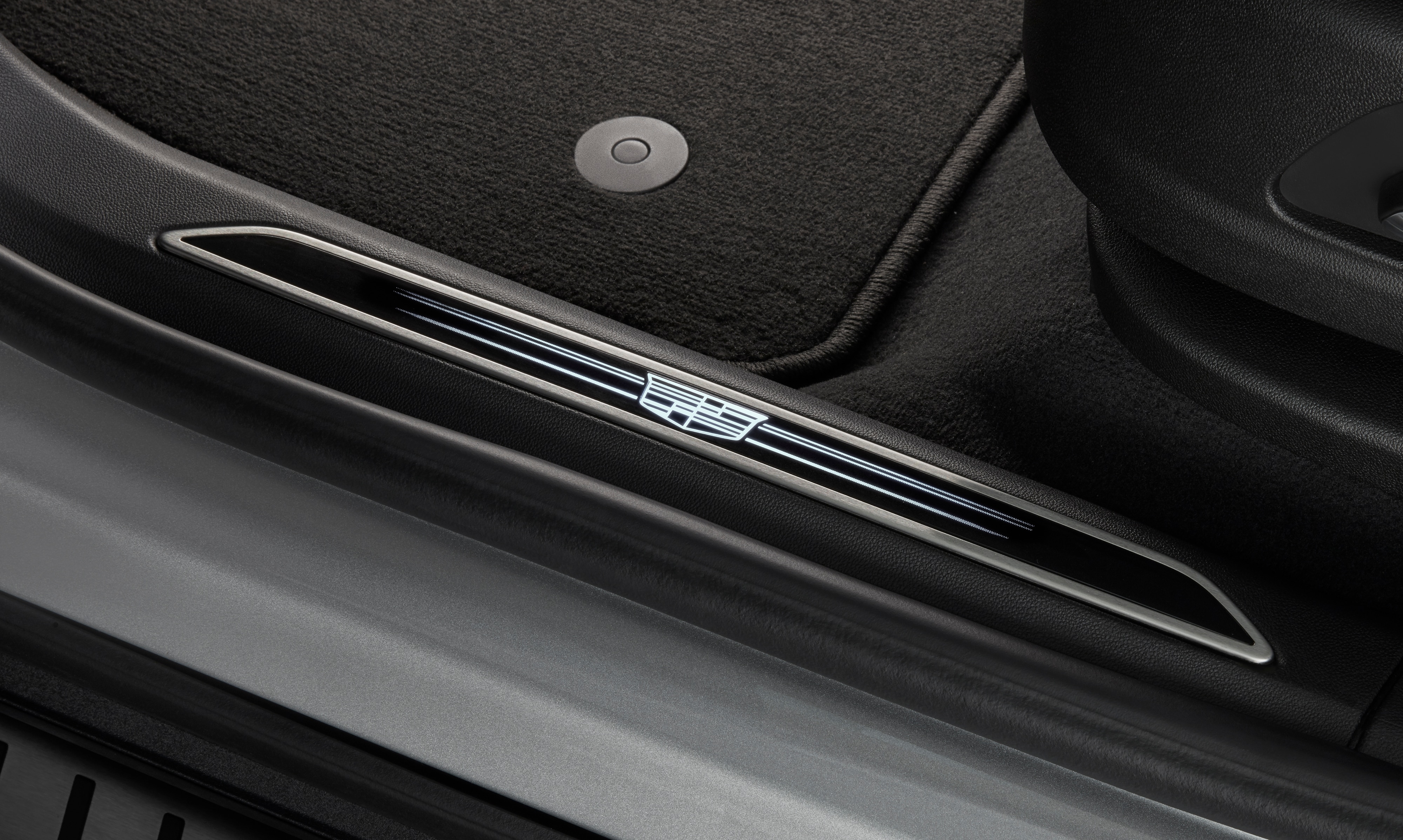 Illuminated Front Door Sill Plates with Jet Black Surround and Cadillac Logo