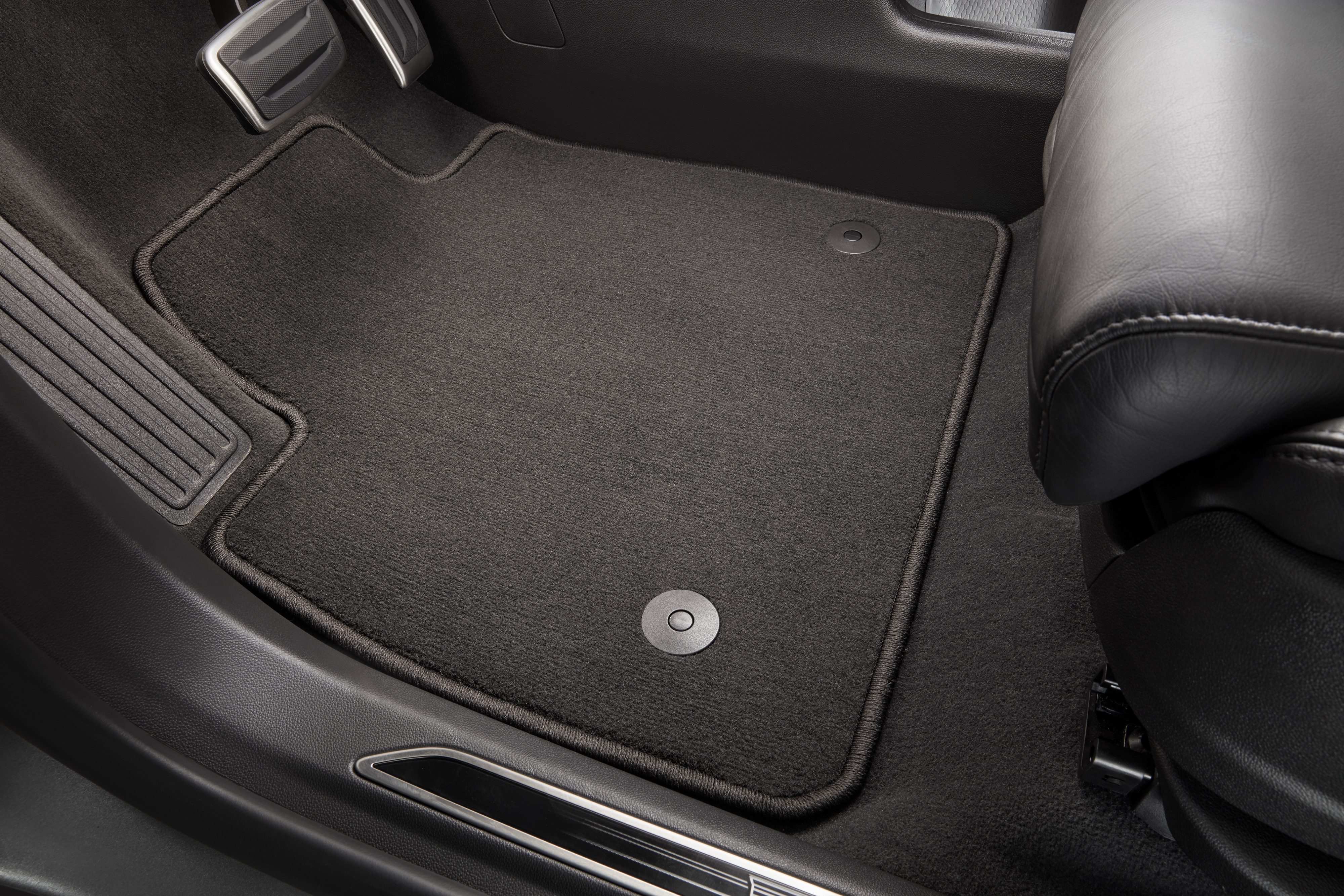 First- and Second-Row Carpeted Floor Mats in Jet Black