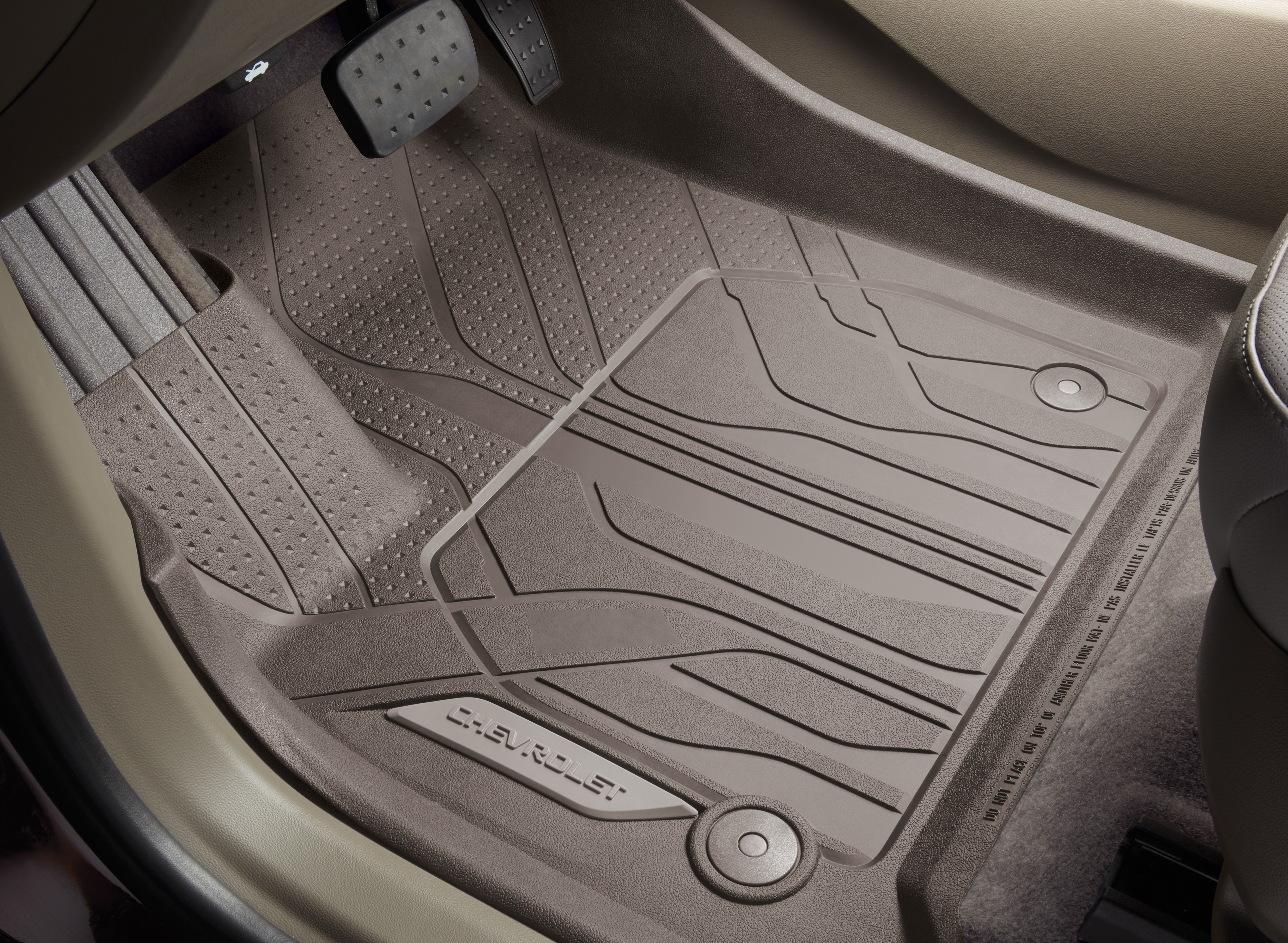 First-Row Premium All-Weather Floor Liners in Dark Atmosphere with Chevrolet Script