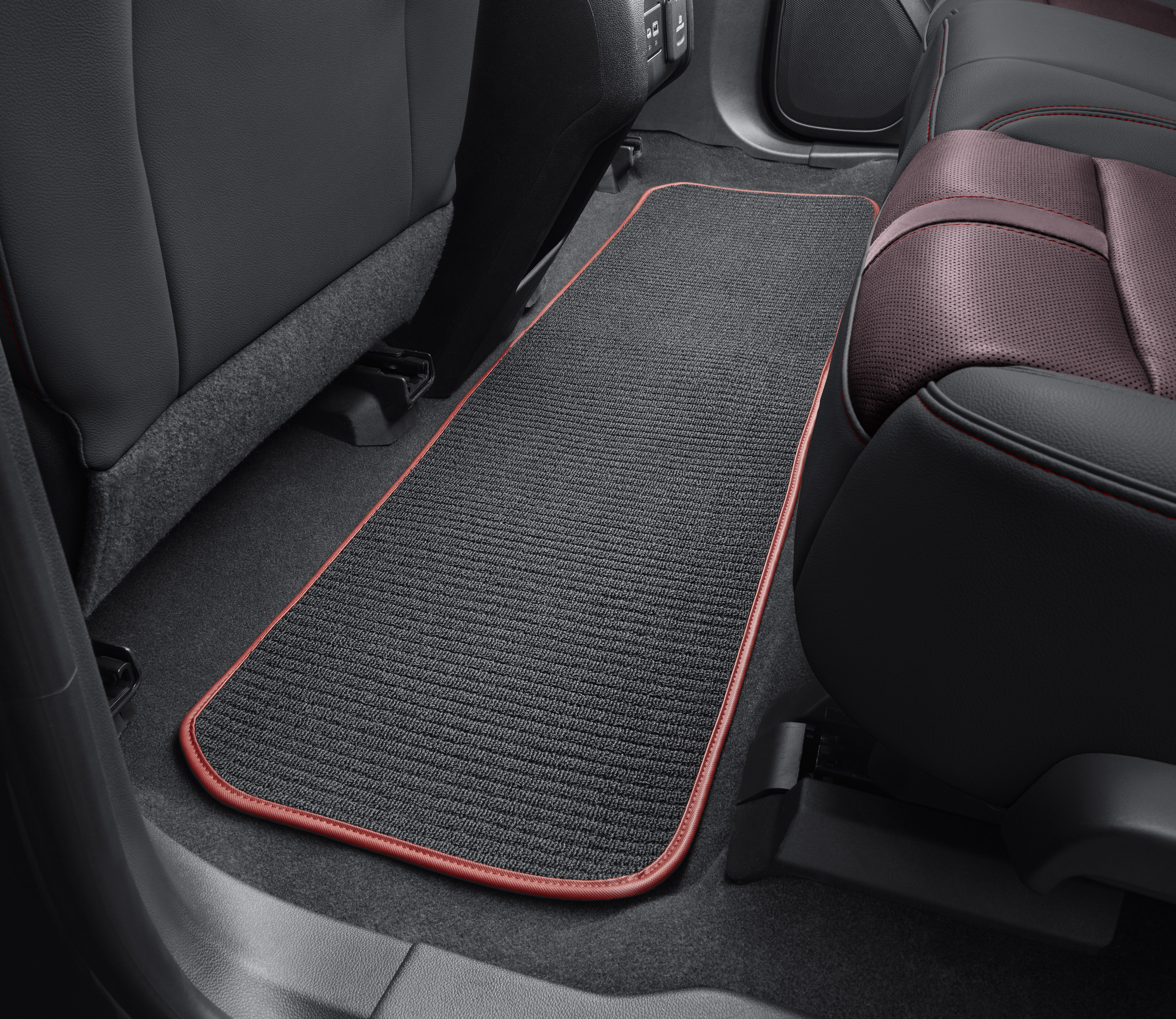 Second-Row One-Piece Premium Carpeted Floor Mat in Jet Black with Red Binding
