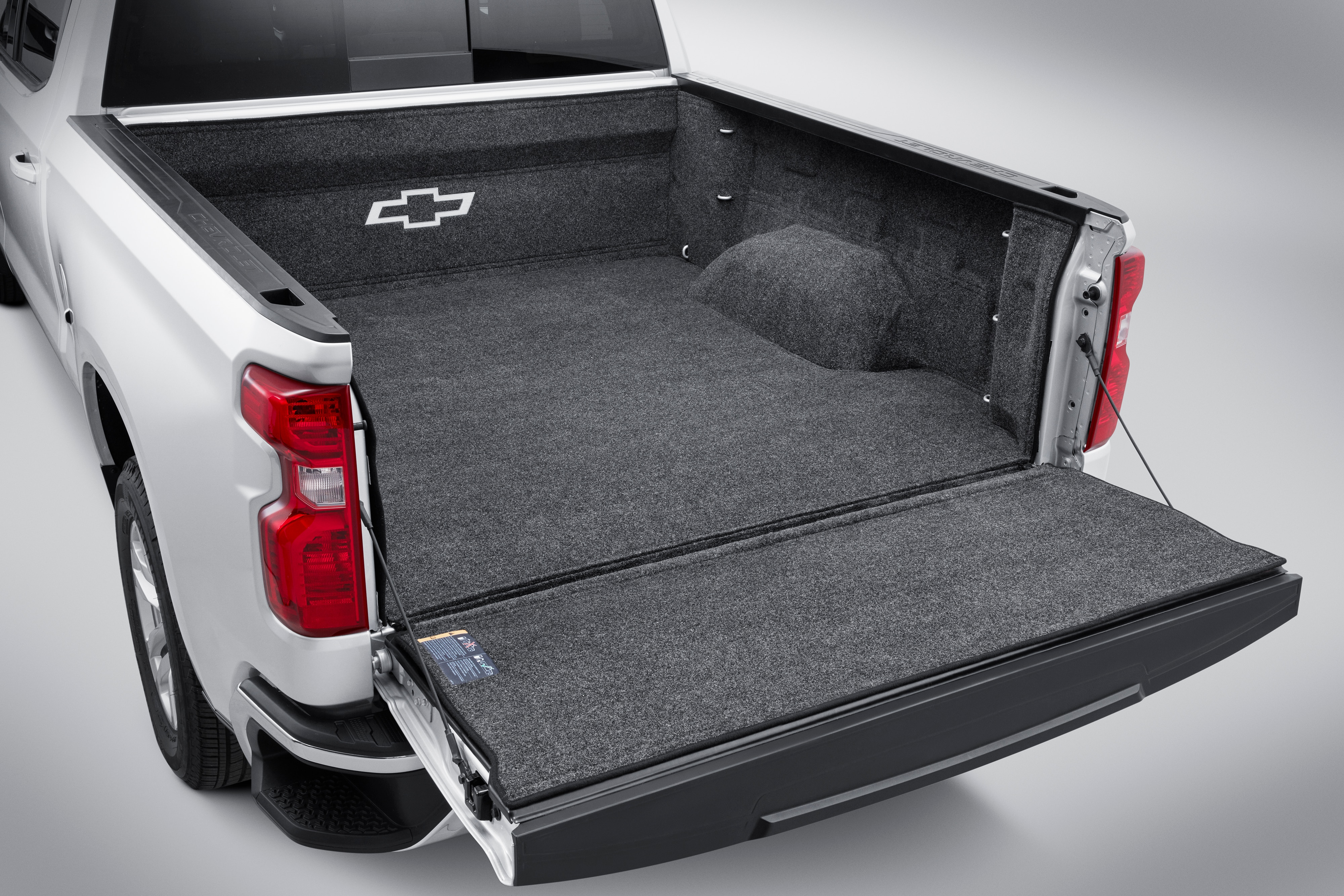 Carpeted Bed Liner with Bowtie Logo (for Short Bed Models)/