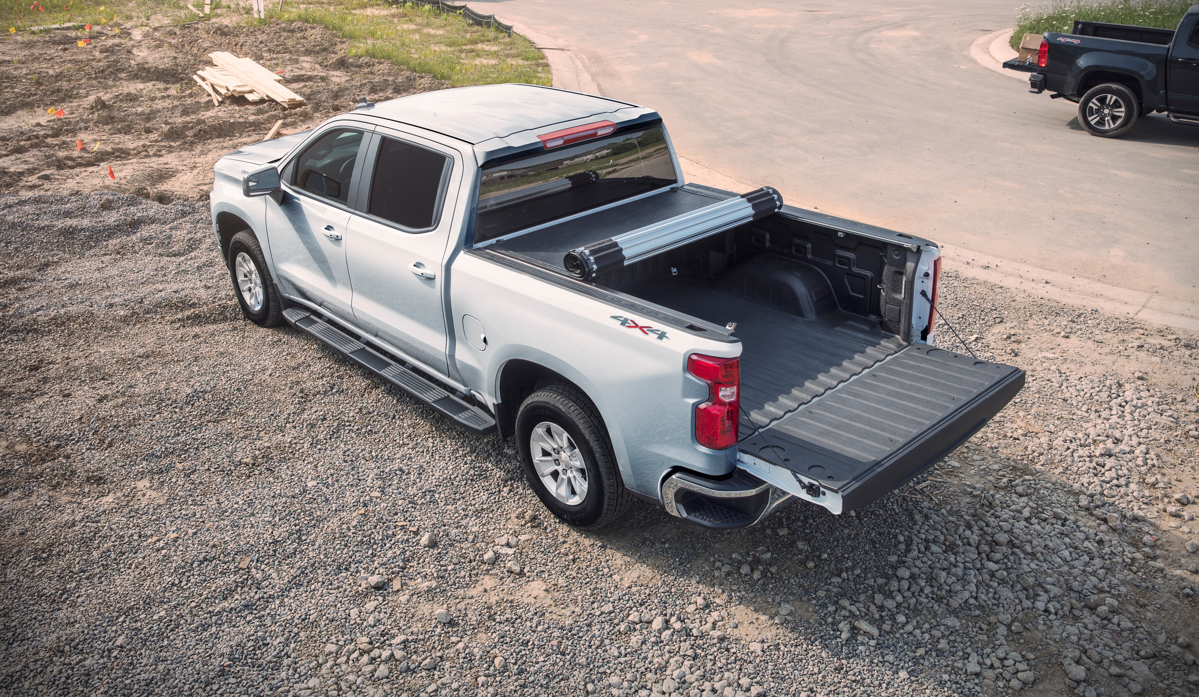 Standard Bed Hard Rolling Truck Bed Cover in Black by Advantage® - Associated Accessories