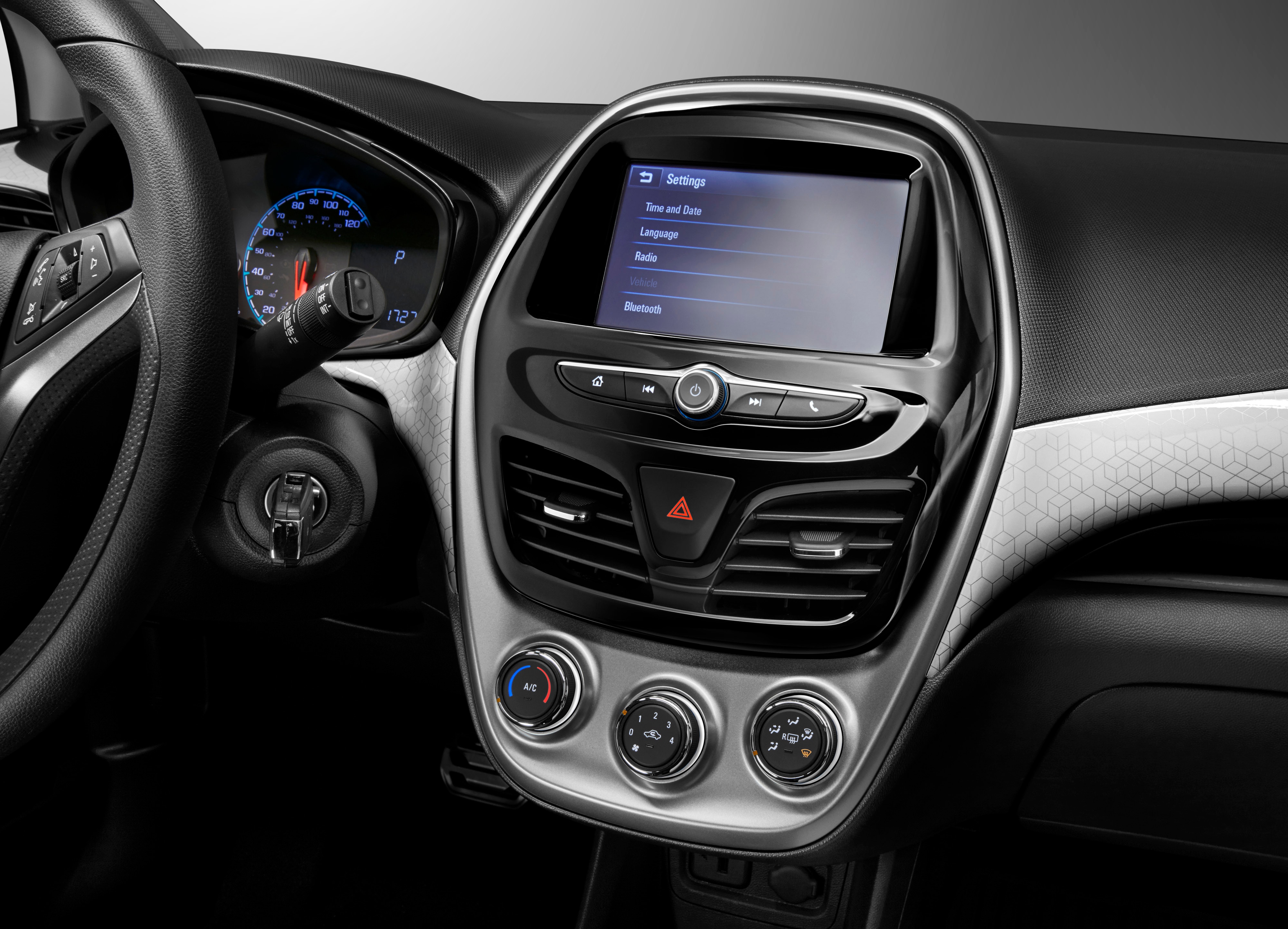 Instrument Panel Trim Plate in Piano Black with Chrome Accents
