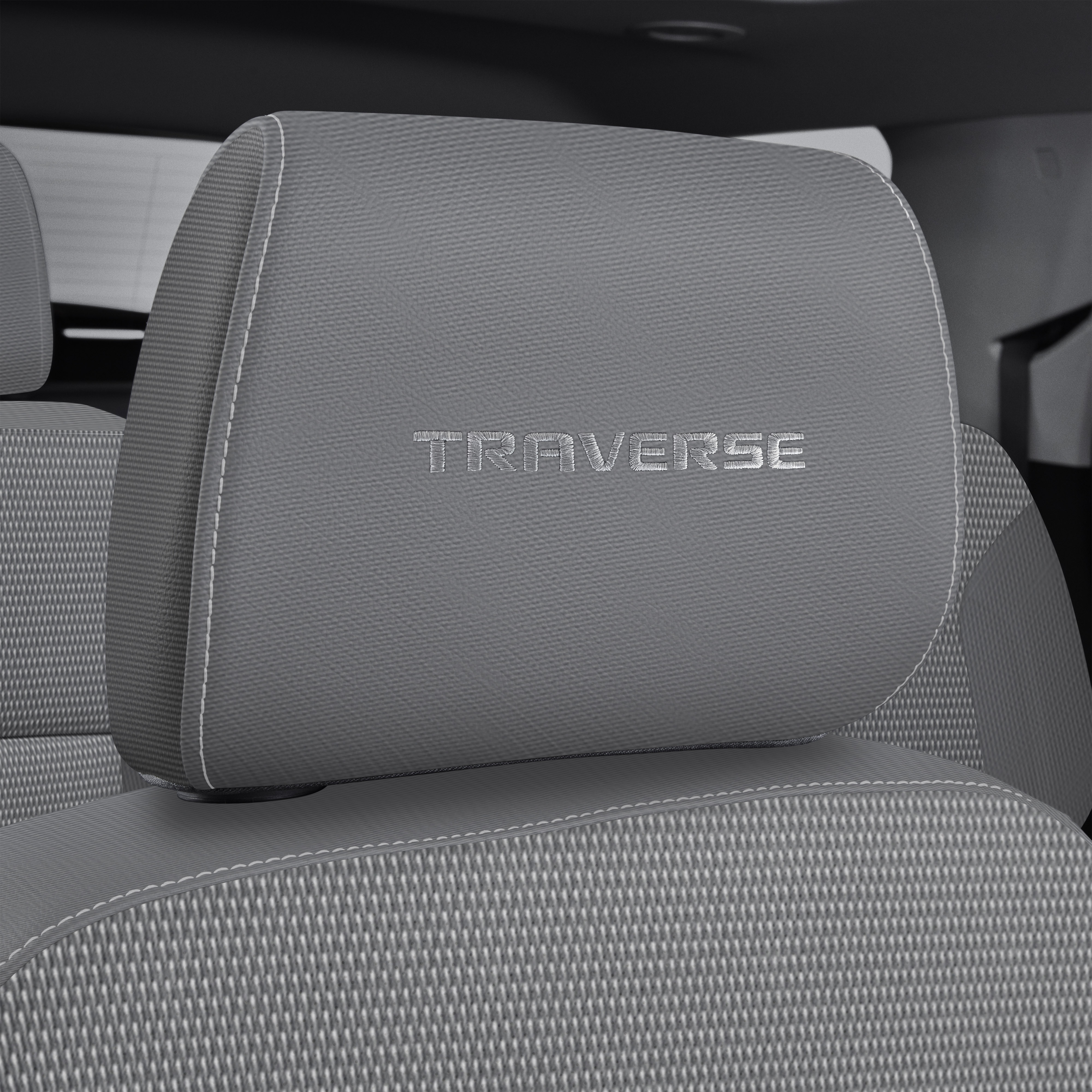 Cloth Headrest in Medium Ash Gray with Embroidered Traverse Script and Light Ash Gray Stitching
