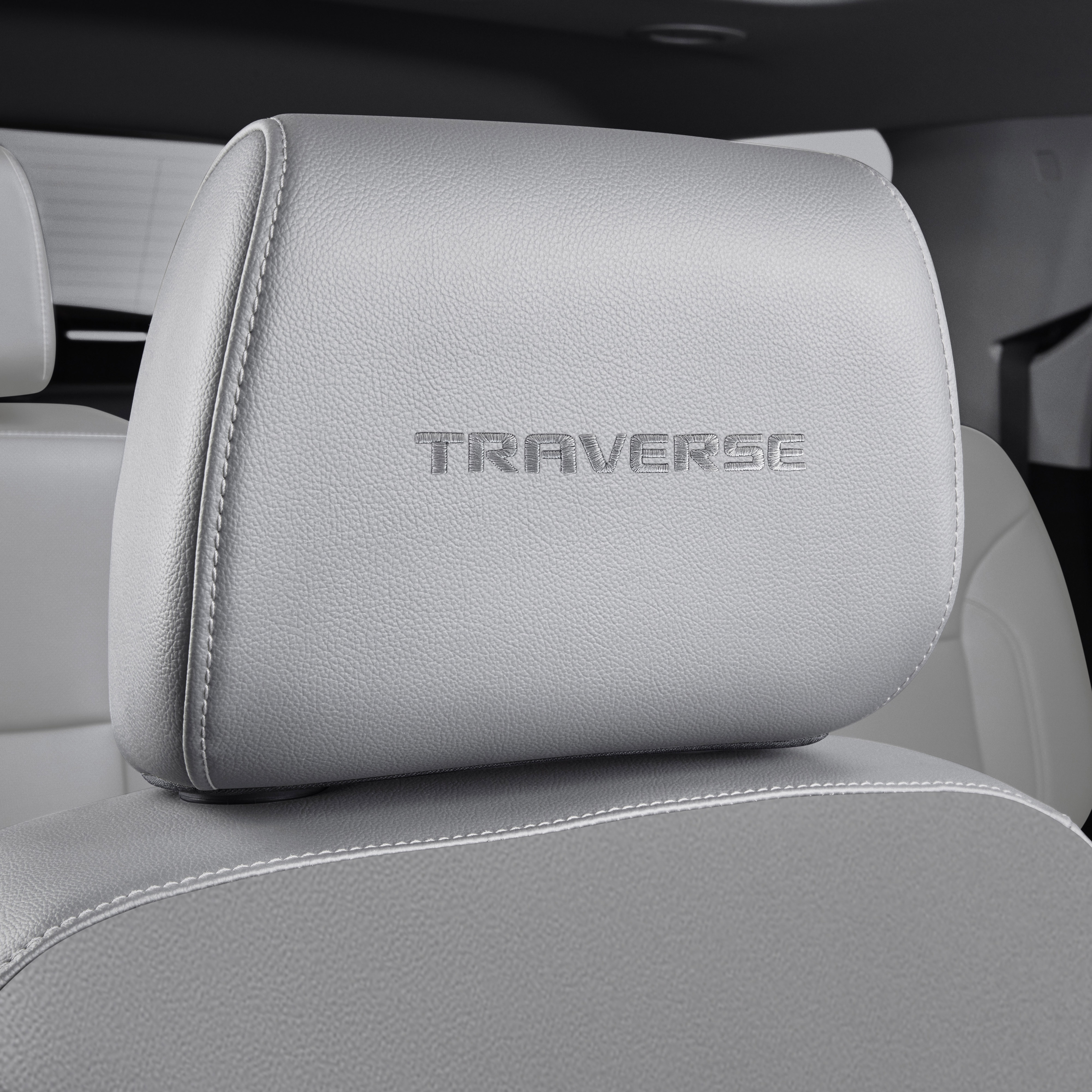 Vinyl Headrest in Medium Ash Gray with Embroidered Traverse Script and Light Ash Gray Stitching