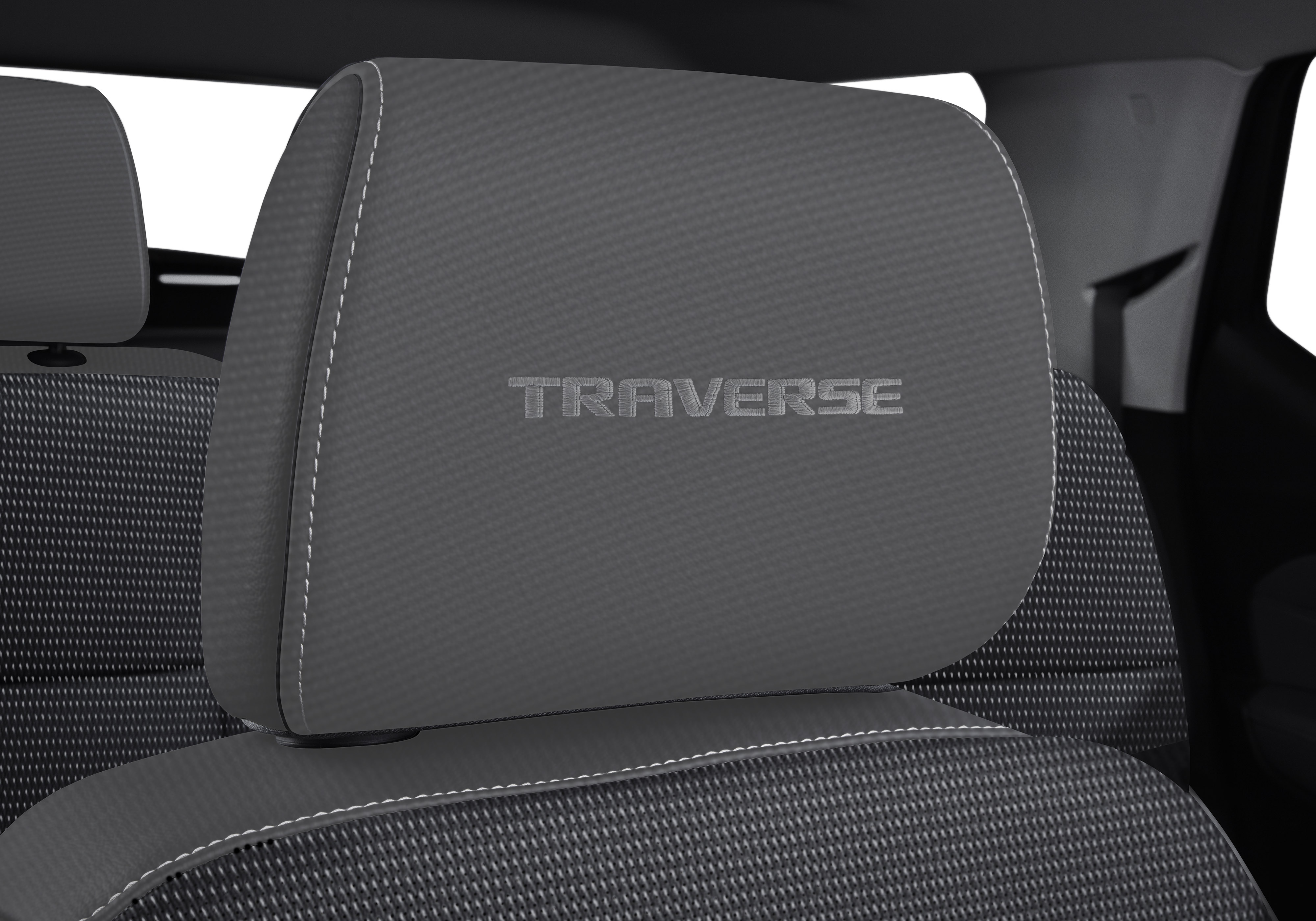 Headrest in Dark Galvanized Cloth with Embroidered Traverse Script in Medium Titanium Stitching