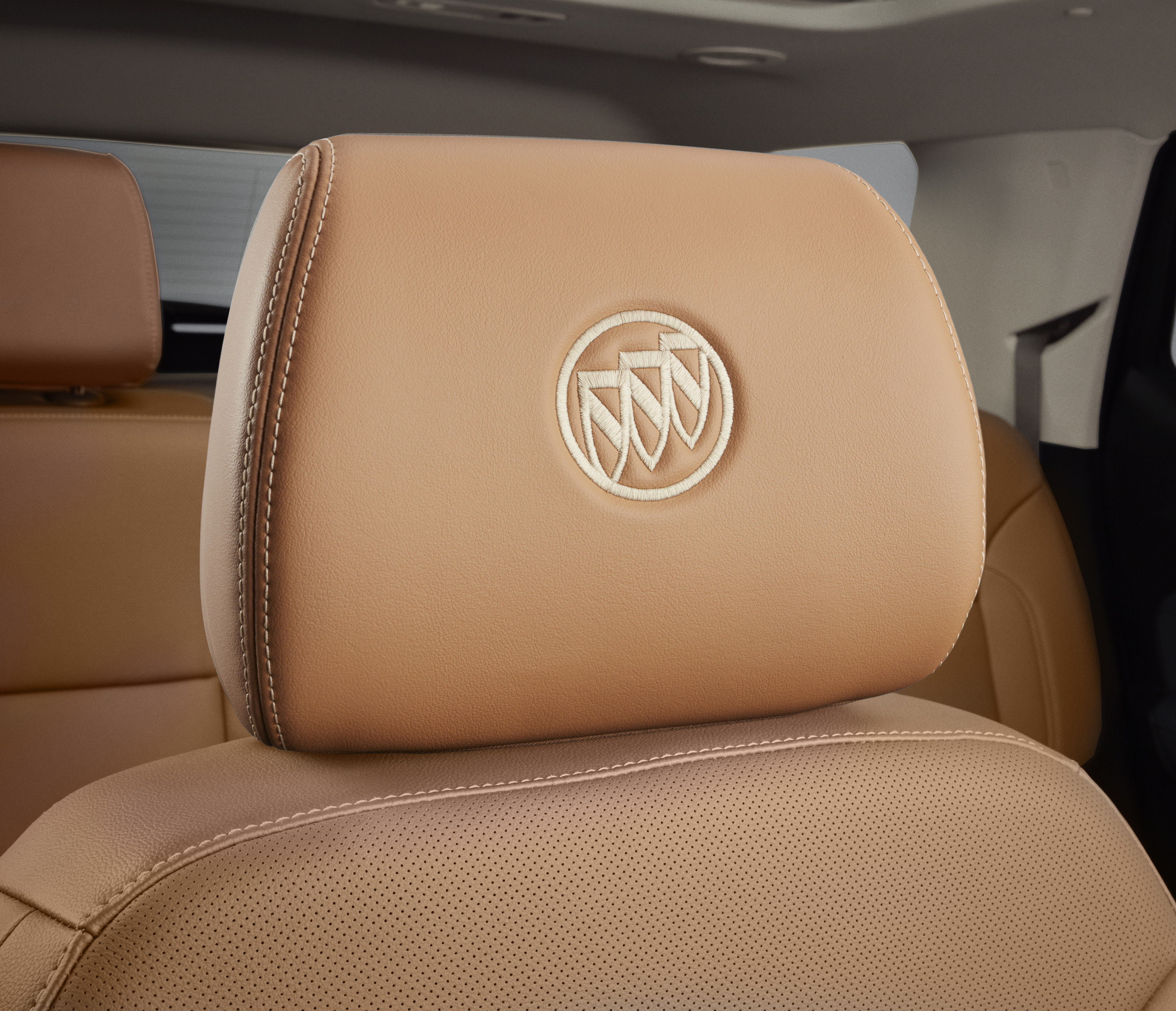 Vinyl Headrest in Brandy Leather with Vanilla Stitch and Embroidered Buick Logo