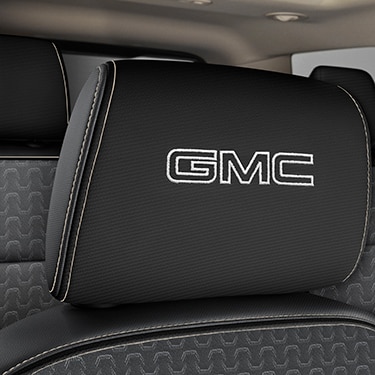 Vinyl Headrest in Jet Black with Embroidered GMC Script in Light Gray Stitching