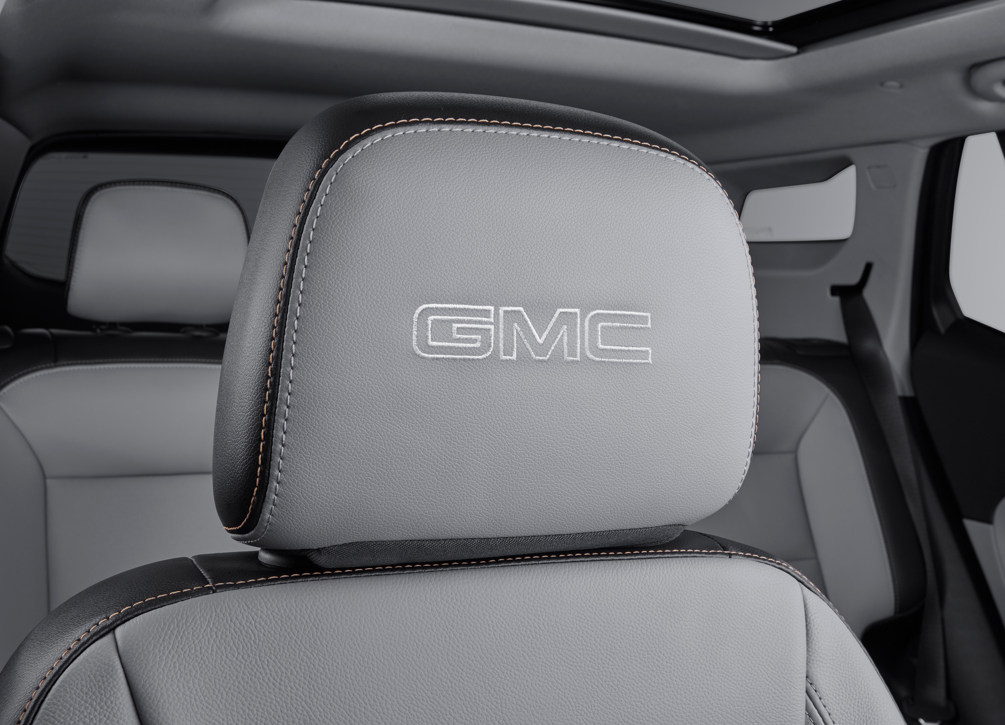 Vinyl Headrest in Medium Ash Gray with Embroidered GMC Script in Medium Gray Stitching