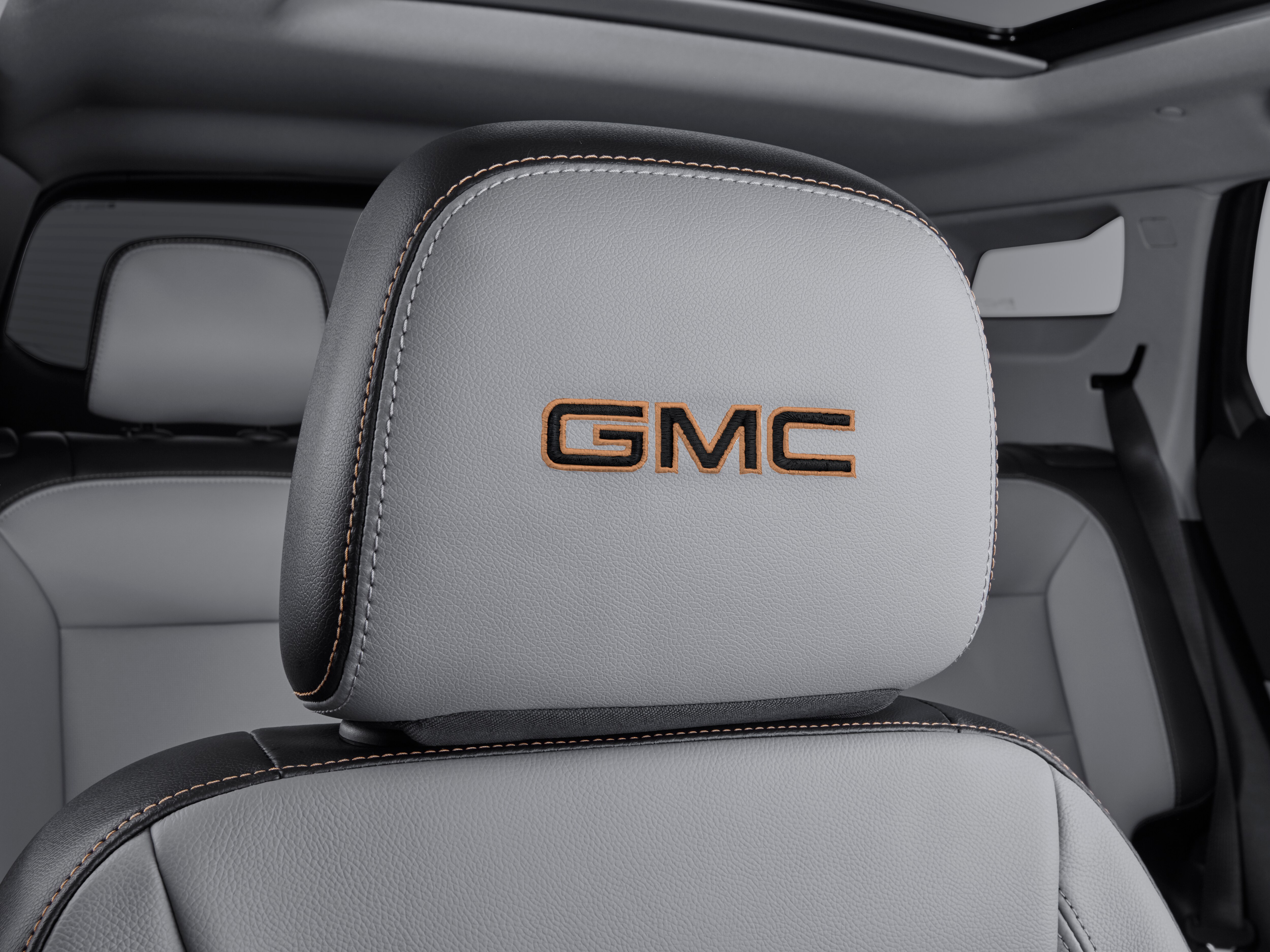 Vinyl Headrest in Medium Ash Gray with Embroidered GMC Script in Medium Gray Stitching