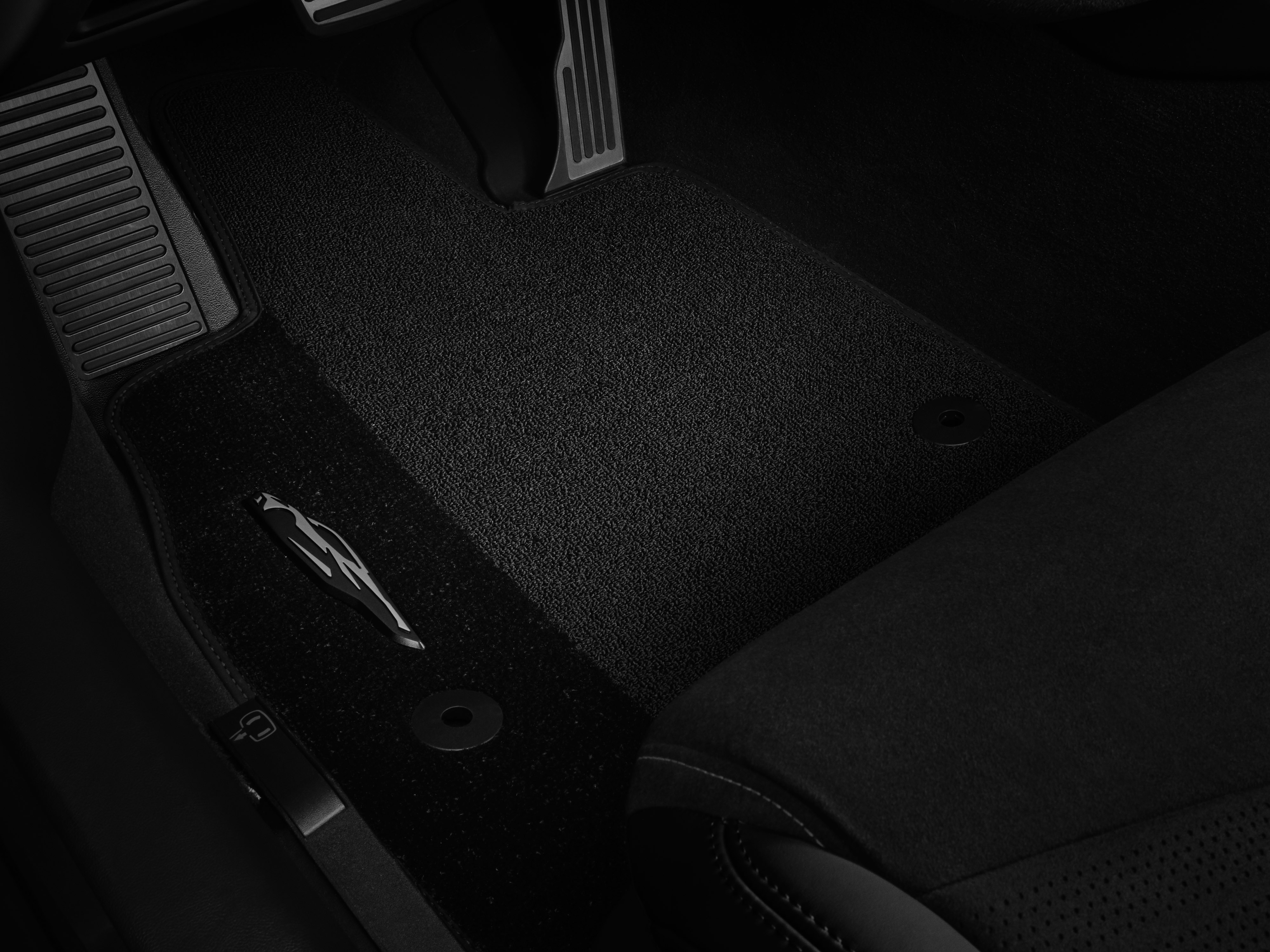First-Row Premium Carpeted Floor Mats in Jet Black with Jet Black Stitching and Corvette Silhouette