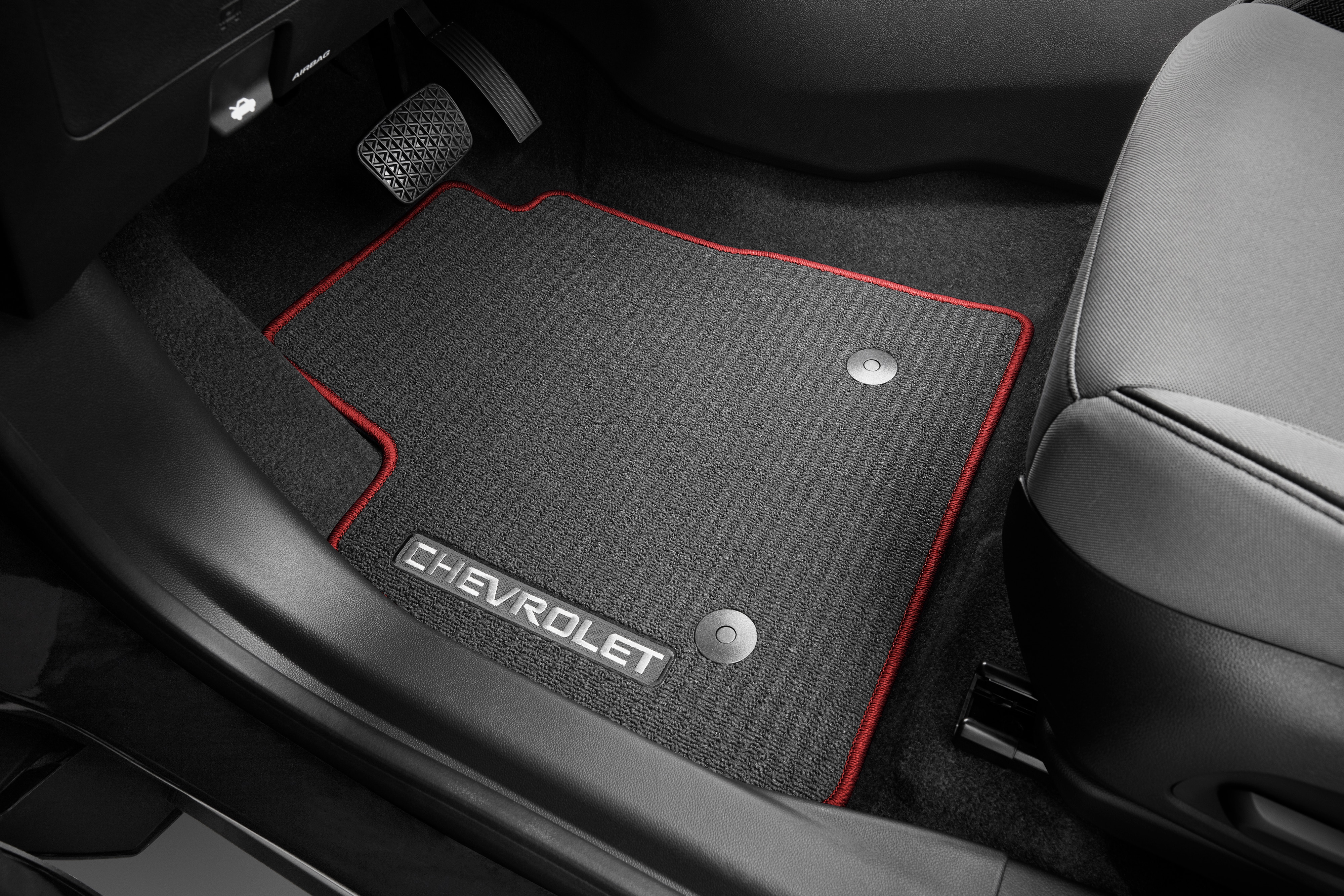 First- and Second-Row Premium Carpeted Floor Mats in Jet Black with Racer Red Binding and Chevrolet Script (for AWD Models)