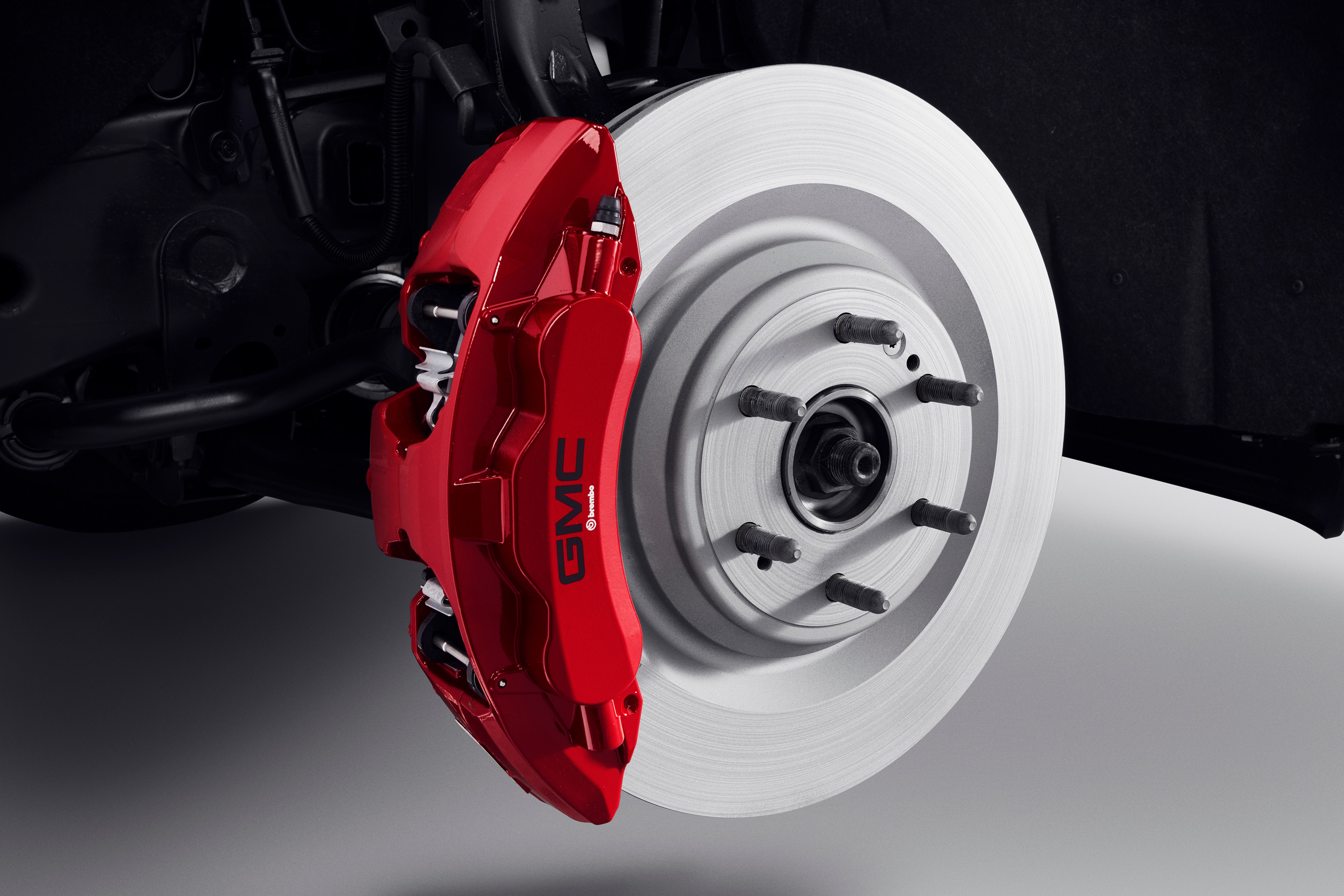 Front 6-Piston Brembo® Brake Upgrade System in Red with GMC Logo
