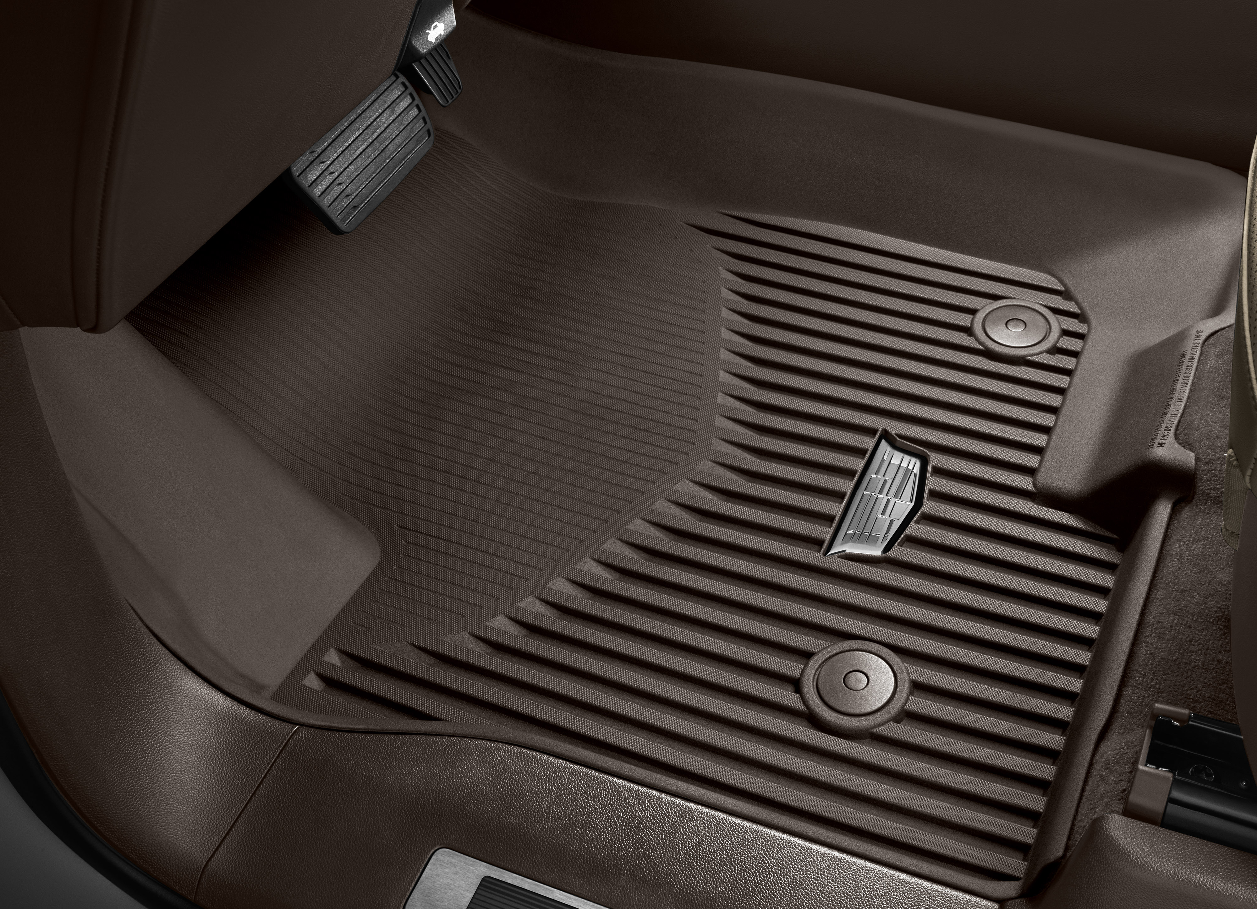 First-Row Premium All-Weather Floor Liners in Very Dark Atmosphere with Cadillac Logo