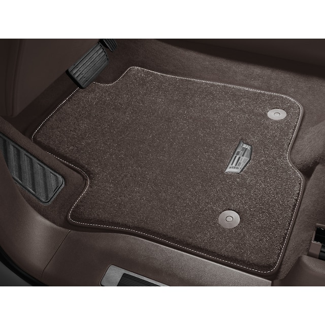 First- and Second-Row Premium Carpeted Floor Mats in Very Dark Atmosphere with Cadillac Logo