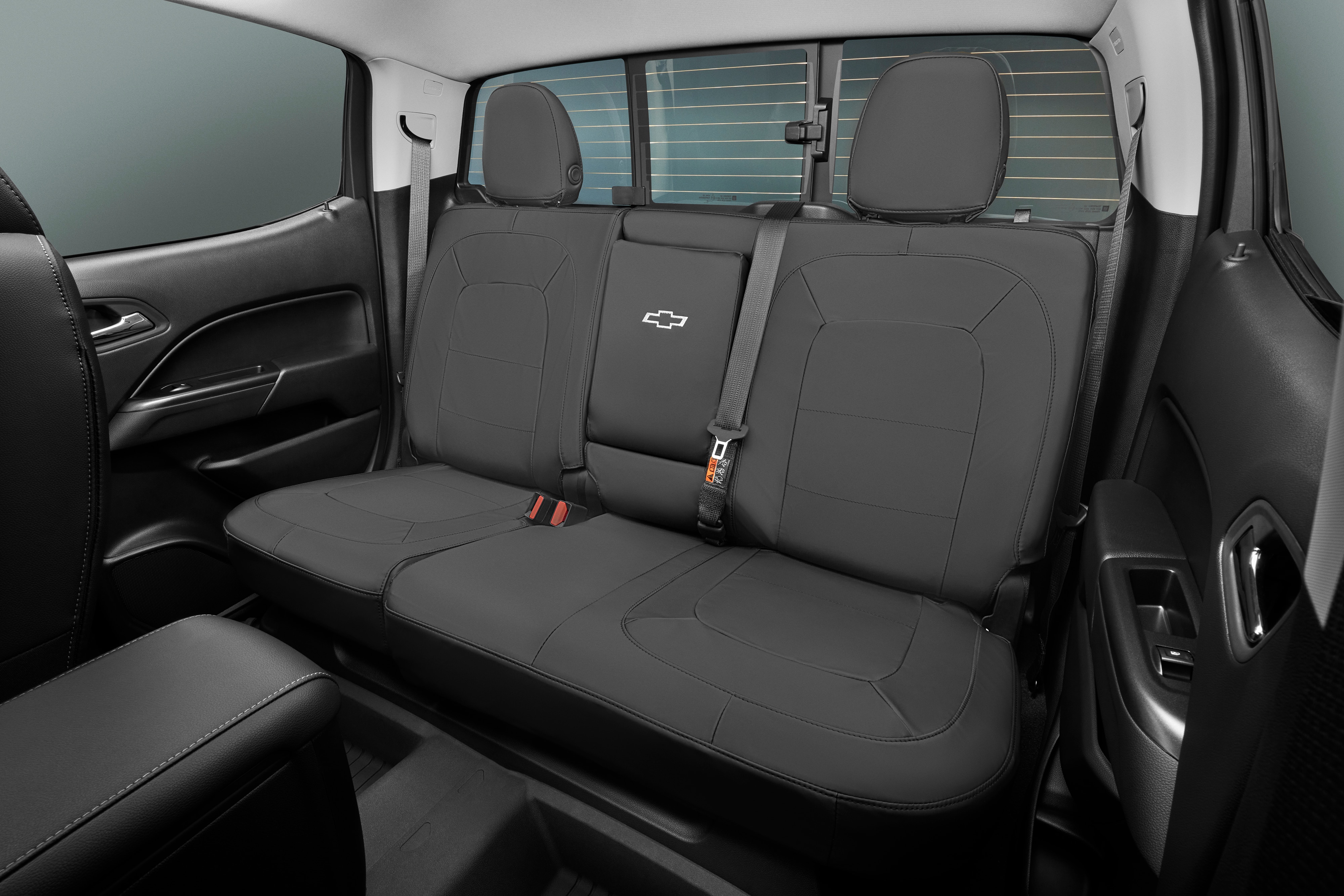 Colorado Protective Crew Cab Rear Seat Cover Set in Jet Black with Bowtie Logo (for Vehicles with Armrest)