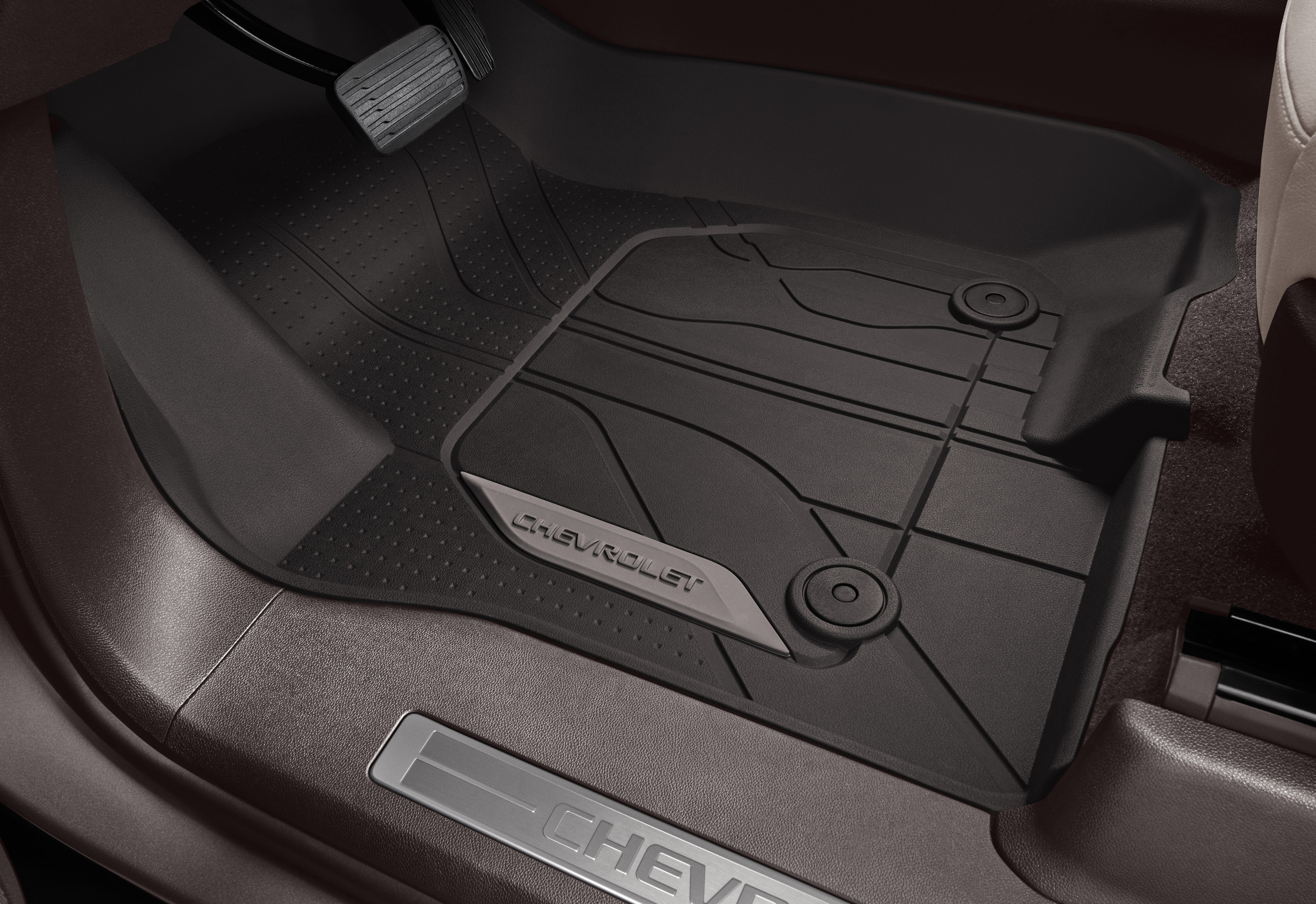 First-Row Premium All-Weather Floor Liners in Very Dark Atmosphere with Chevrolet Script