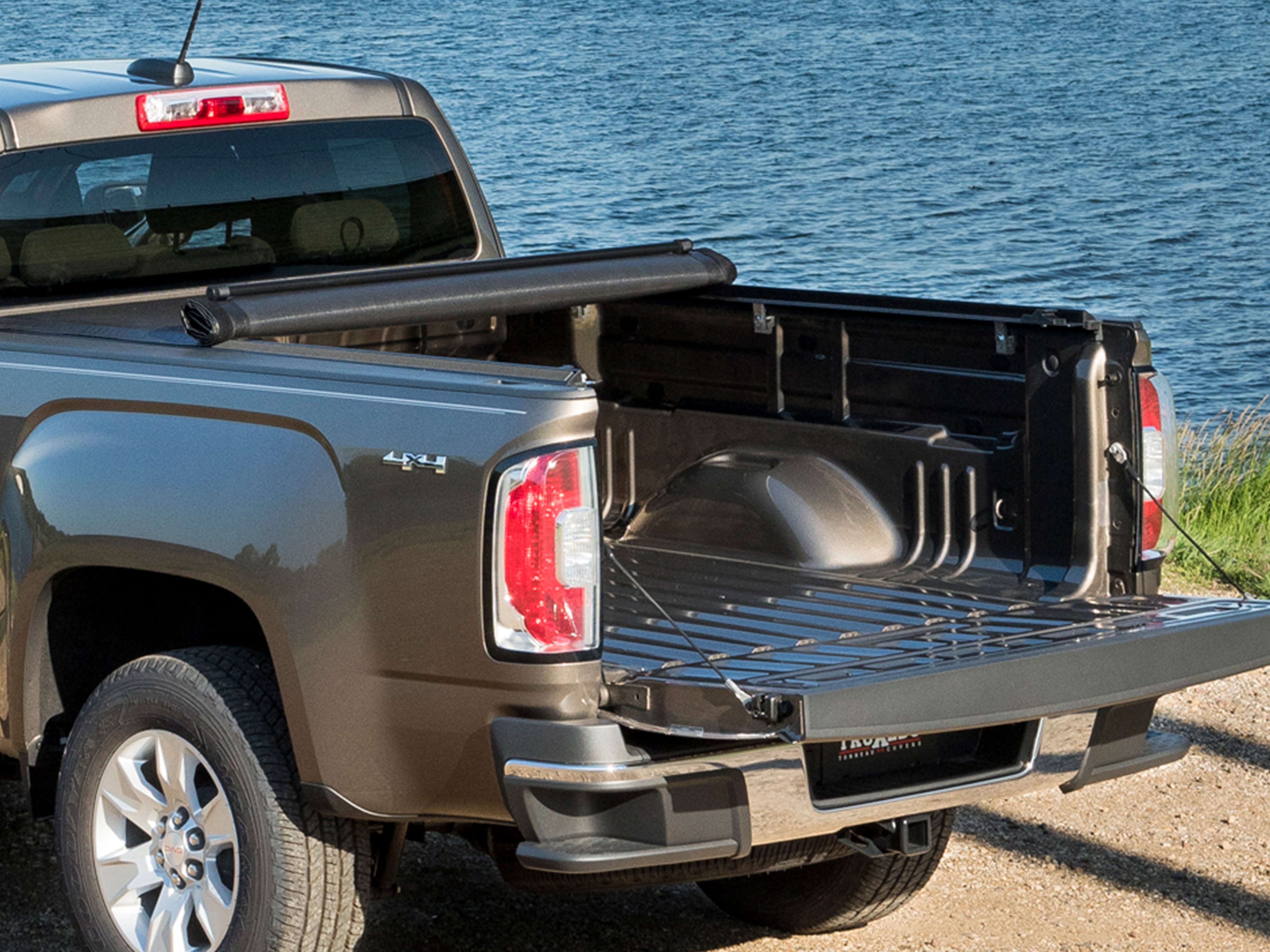 Short Bed Premier Soft Roll-Up Truck Bed Cover in Black by Advantage® - Associated Accessories