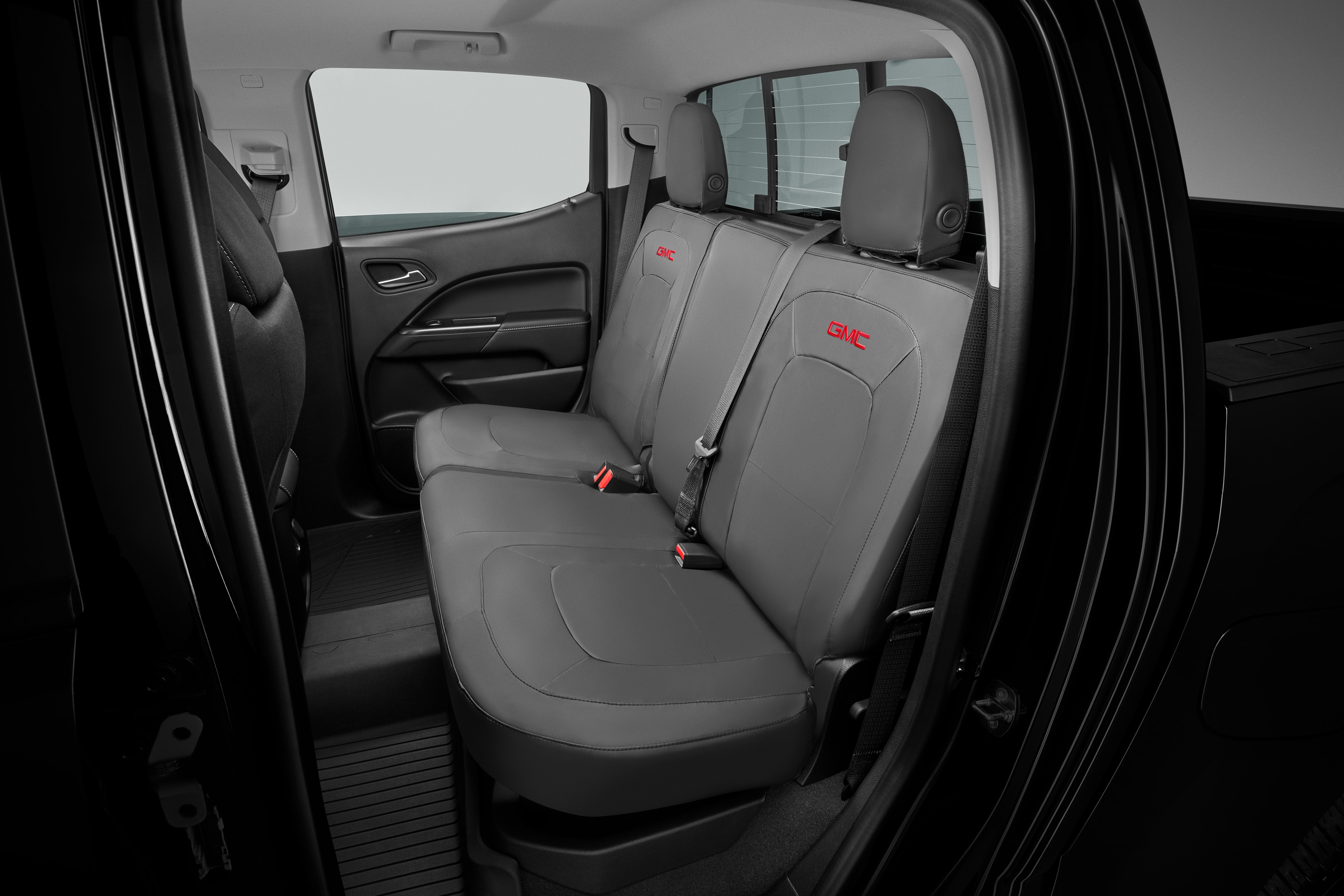 Canyon Protective Crew Cab Rear Seat Cover Set in Jet Black with GMC Logo (for Vehicles without Armrest)