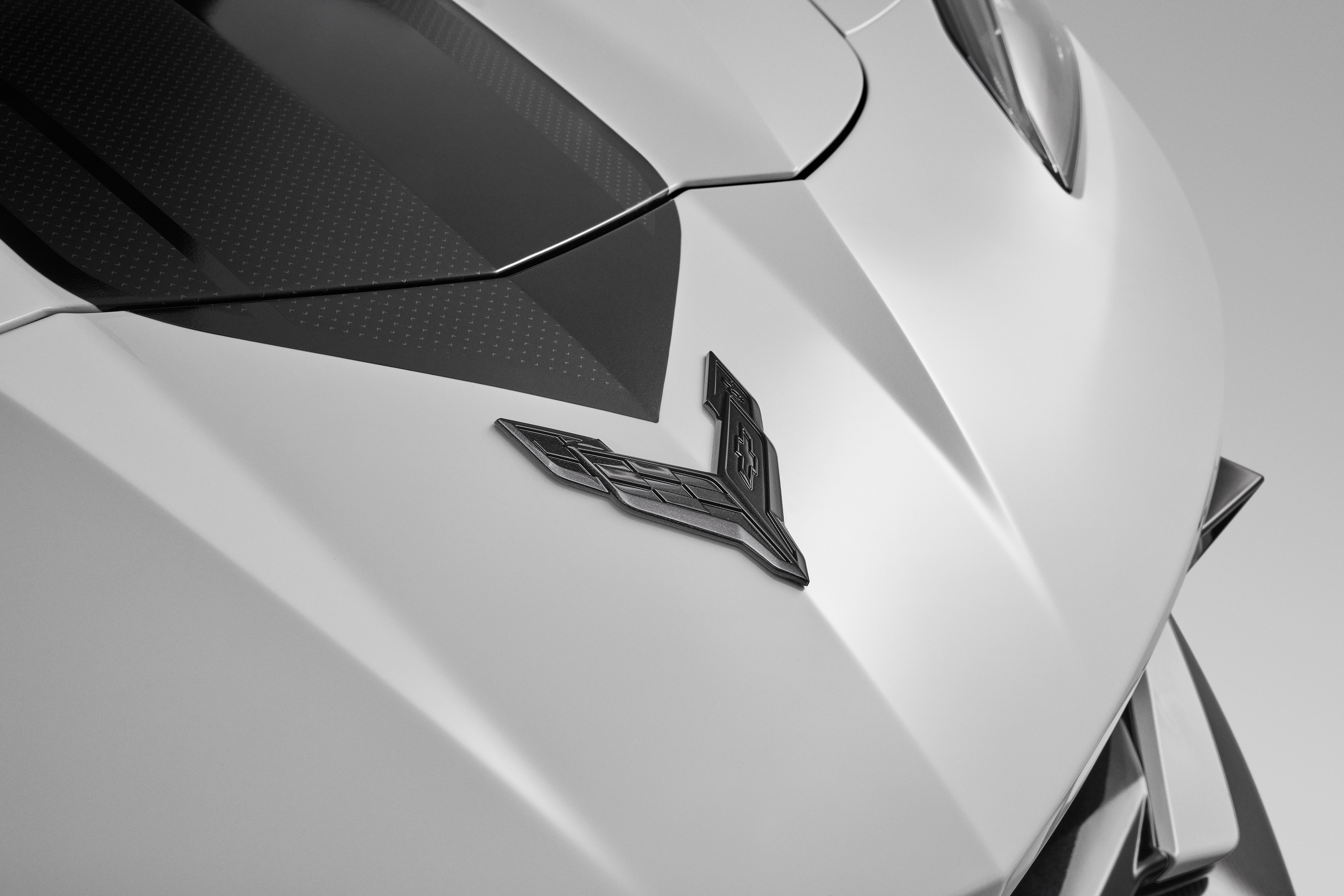 Front Crossed Flags Emblem in Carbon Flash Metallic