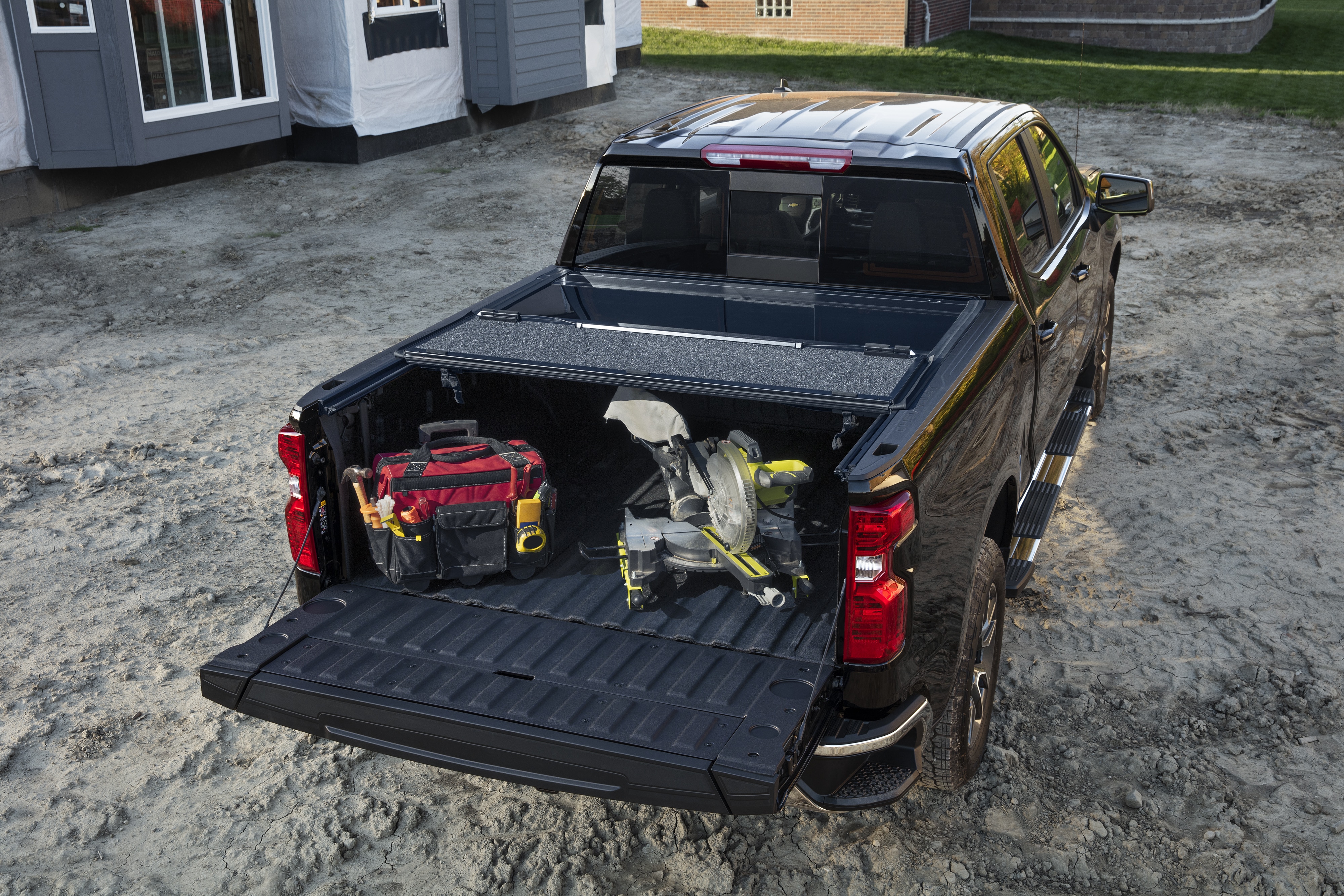 Short Bed Hard Folding Painted Tonneau Cover in Black by UnderCover™ - Associated Accessories