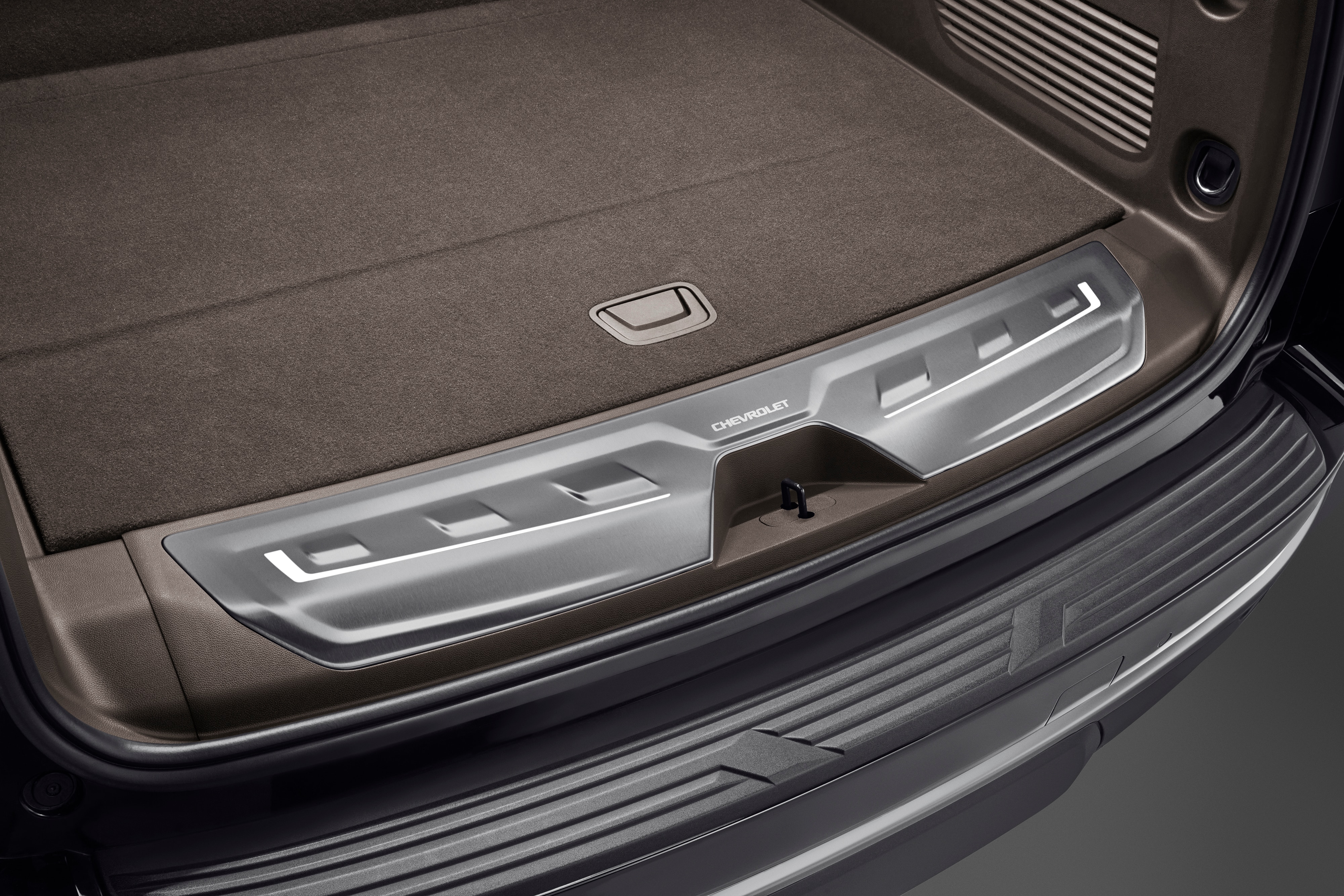 Illuminated Cargo Sill Plates in Very Dark Atmosphere with Chevrolet Script