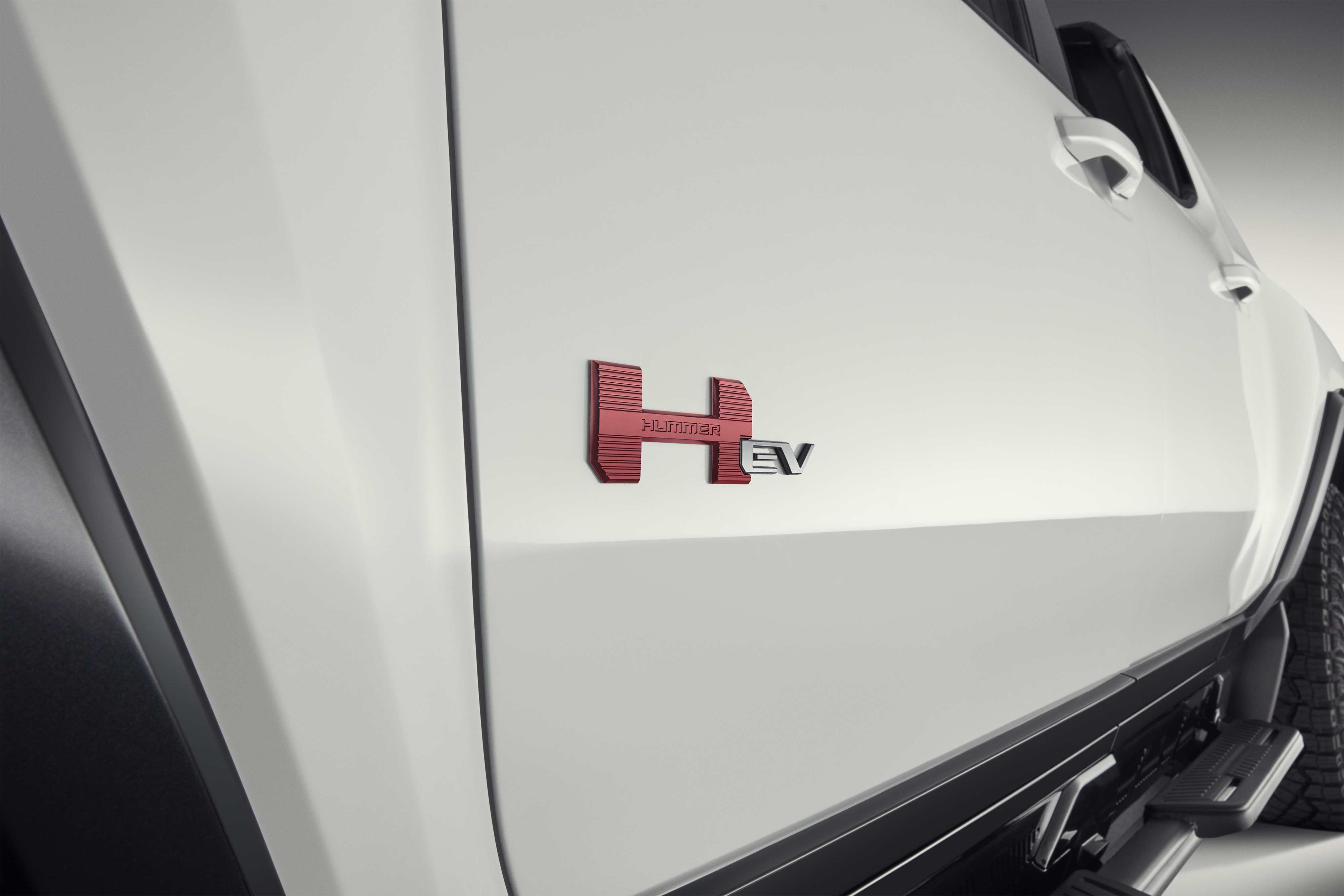 HUMMER EV Emblems in Performance Red