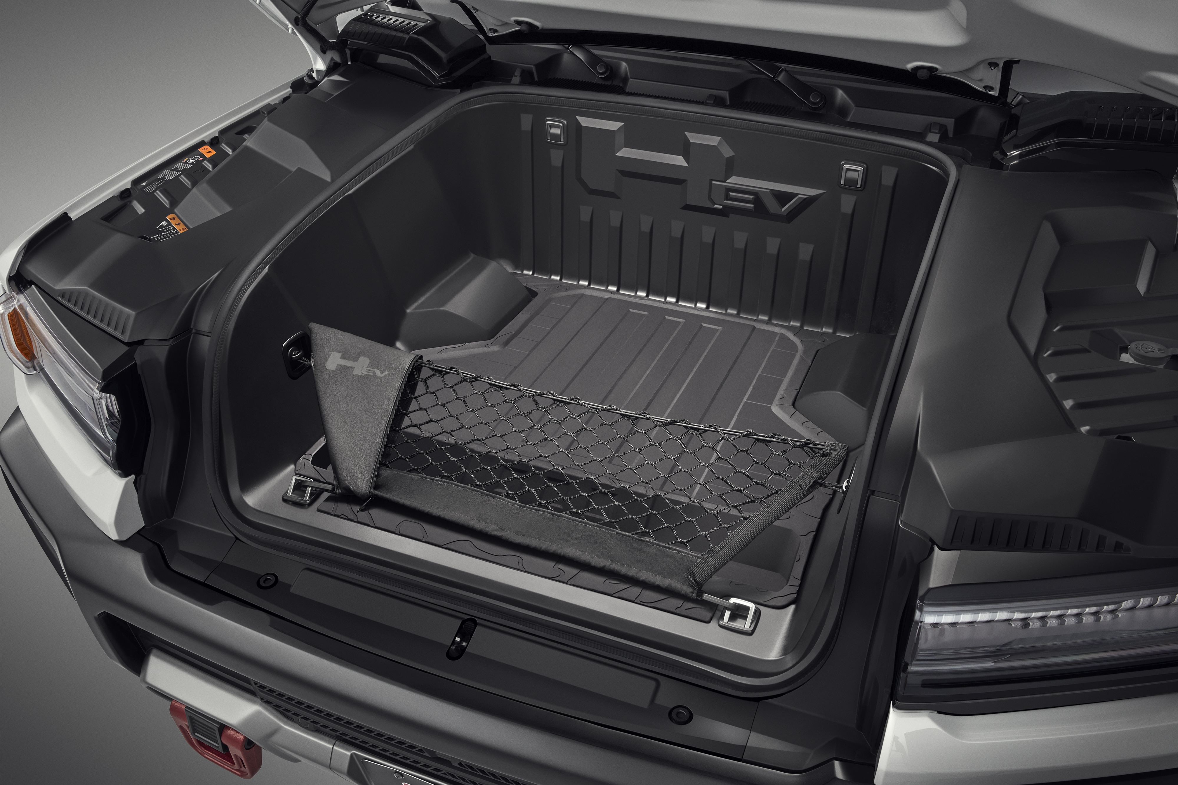 Vertical Cargo Net for eTrunk™ with Storage Bag featuring the GMC HUMMER EV Logo