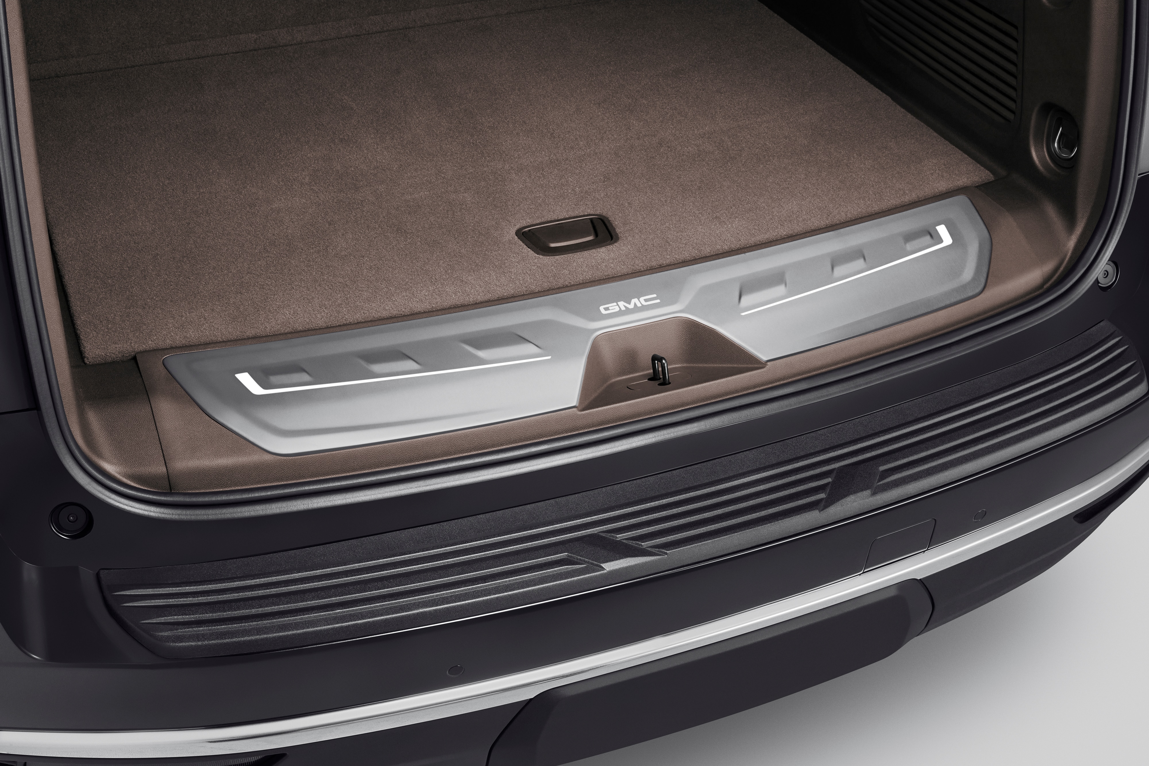 Illuminated Cargo Sill Plate in Very Dark Atmosphere with GMC Logo