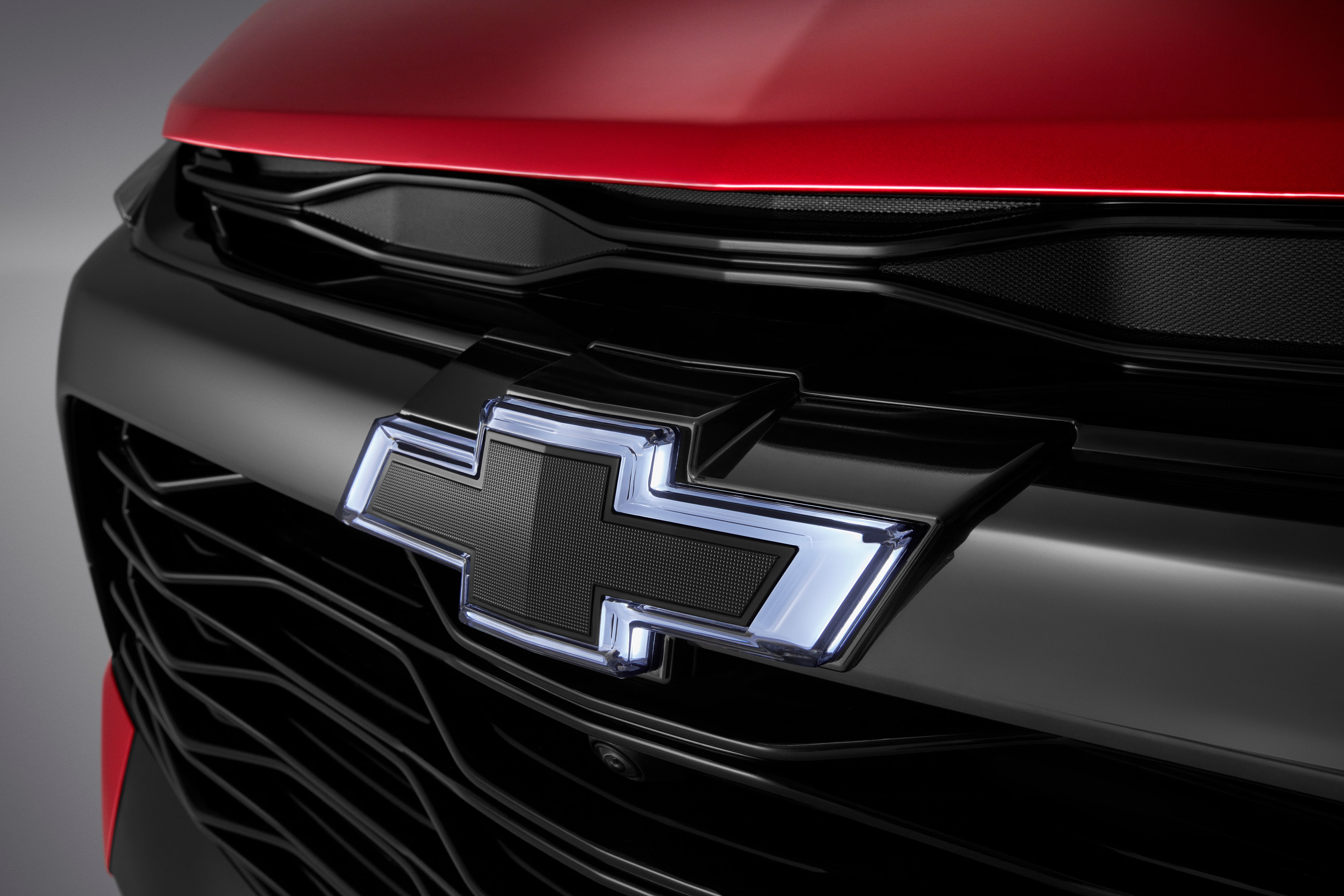 Front Illuminated and Rear Non-Illuminated Bowtie Emblems in Black
