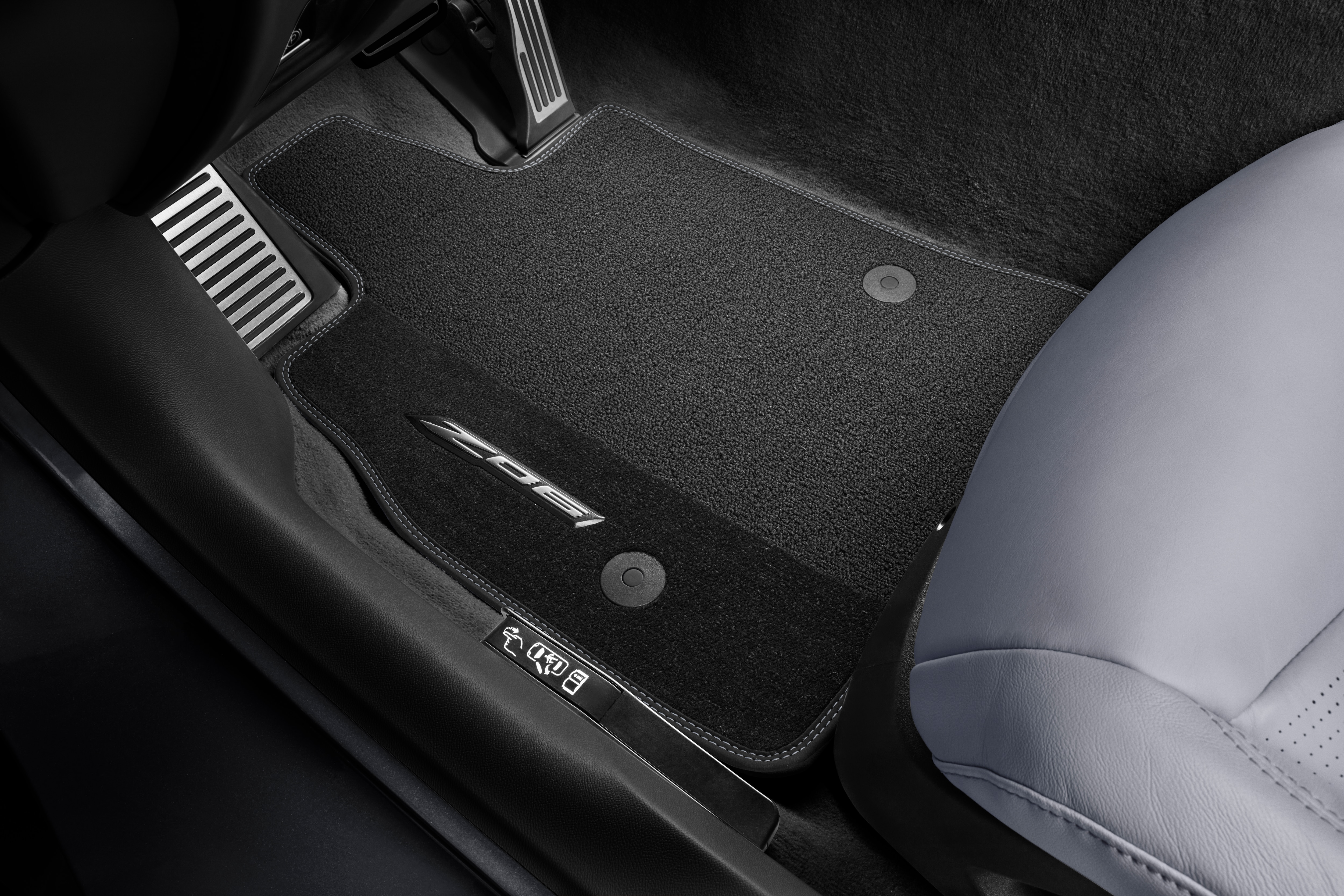 First-Row Premium Carpeted Floor Mats in Jet Black with Sky Cool Gray Stitching and Z06 Script