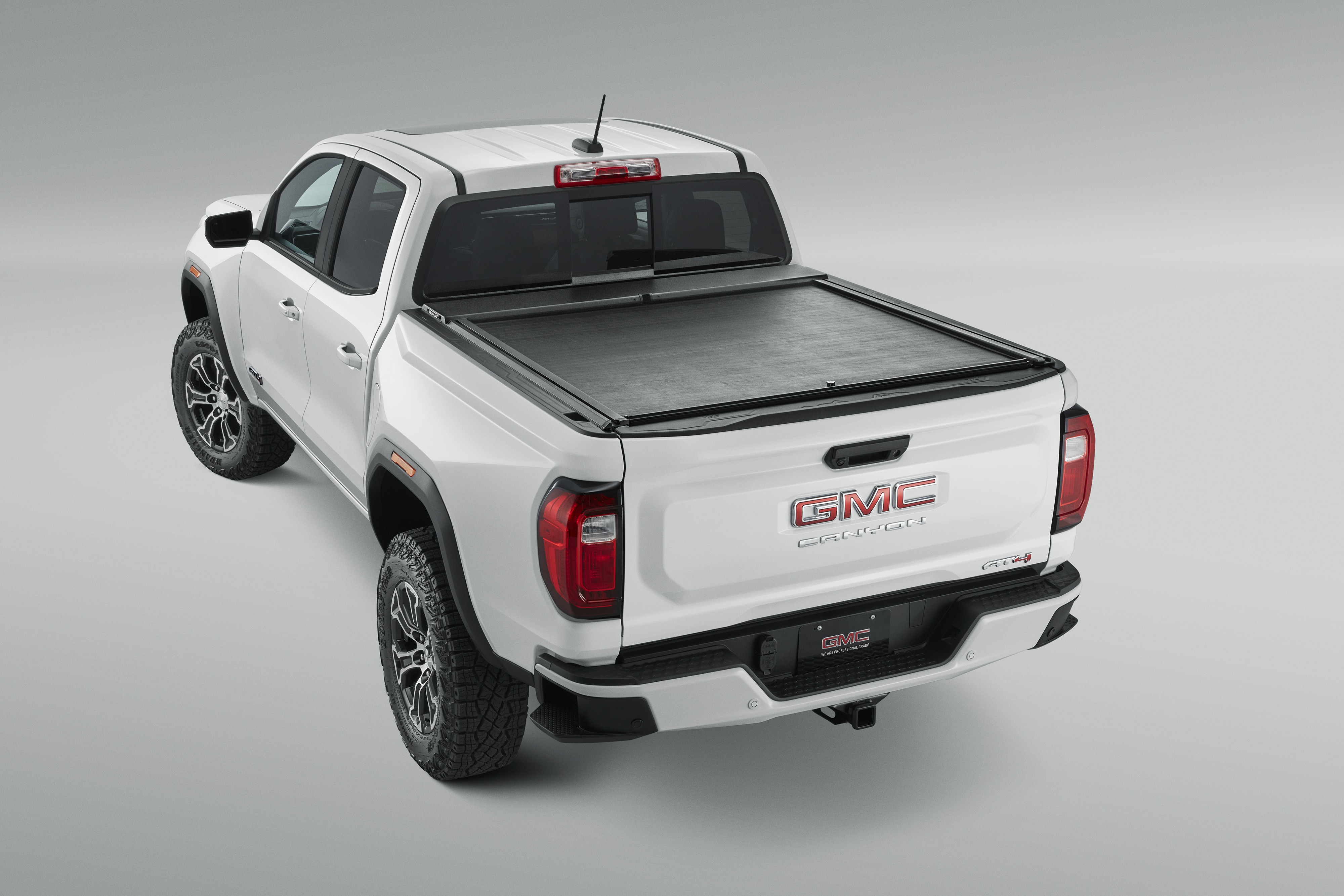 Short Bed Retractable Truck Bed Cover with T-Slot Rails in Black by Advantage® - Associated Accessories