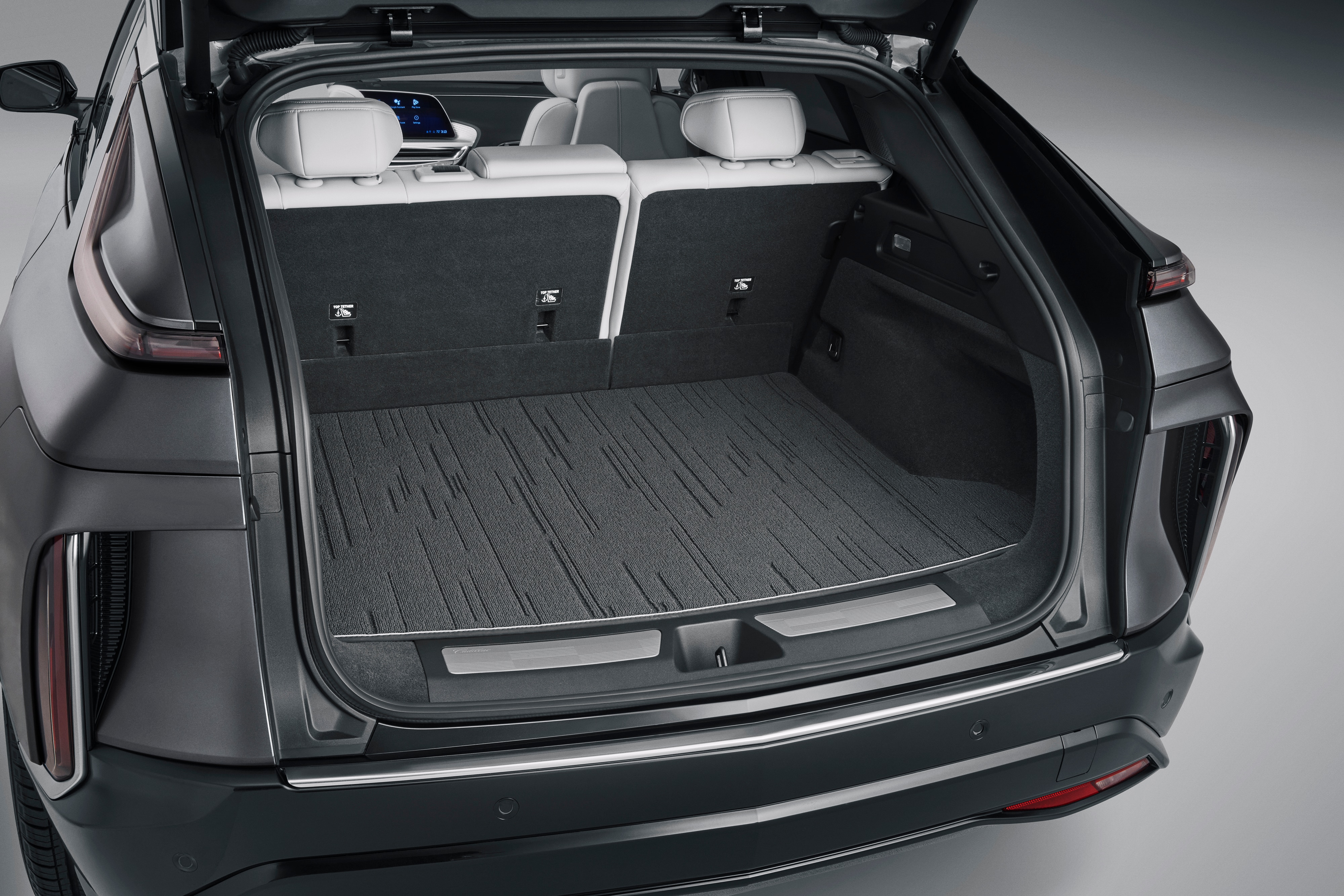Premium Carpeted Cargo Area Mat in Noir with Cadillac Script