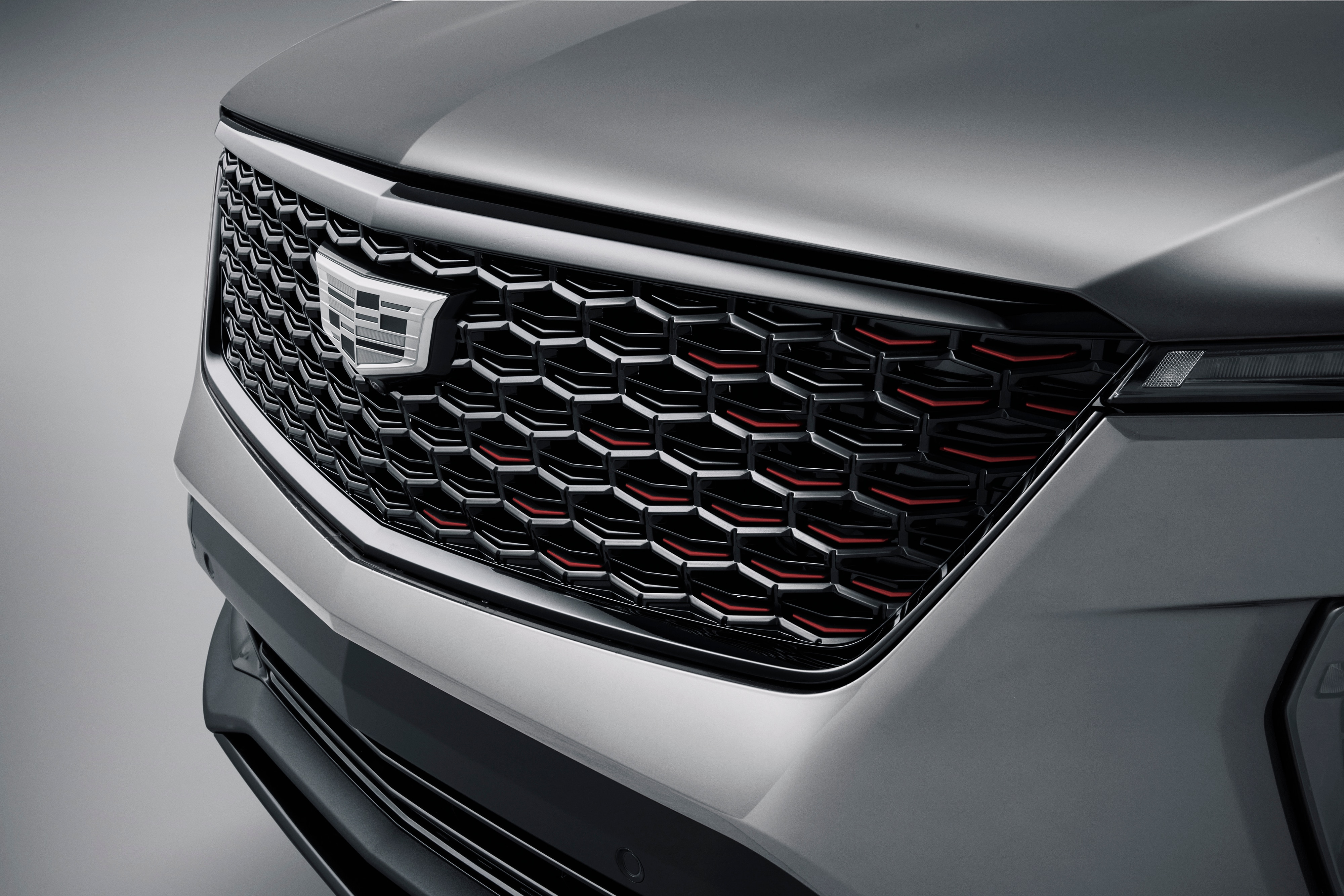 Cadillac Grille in Gloss Black with Silver Surround and Red