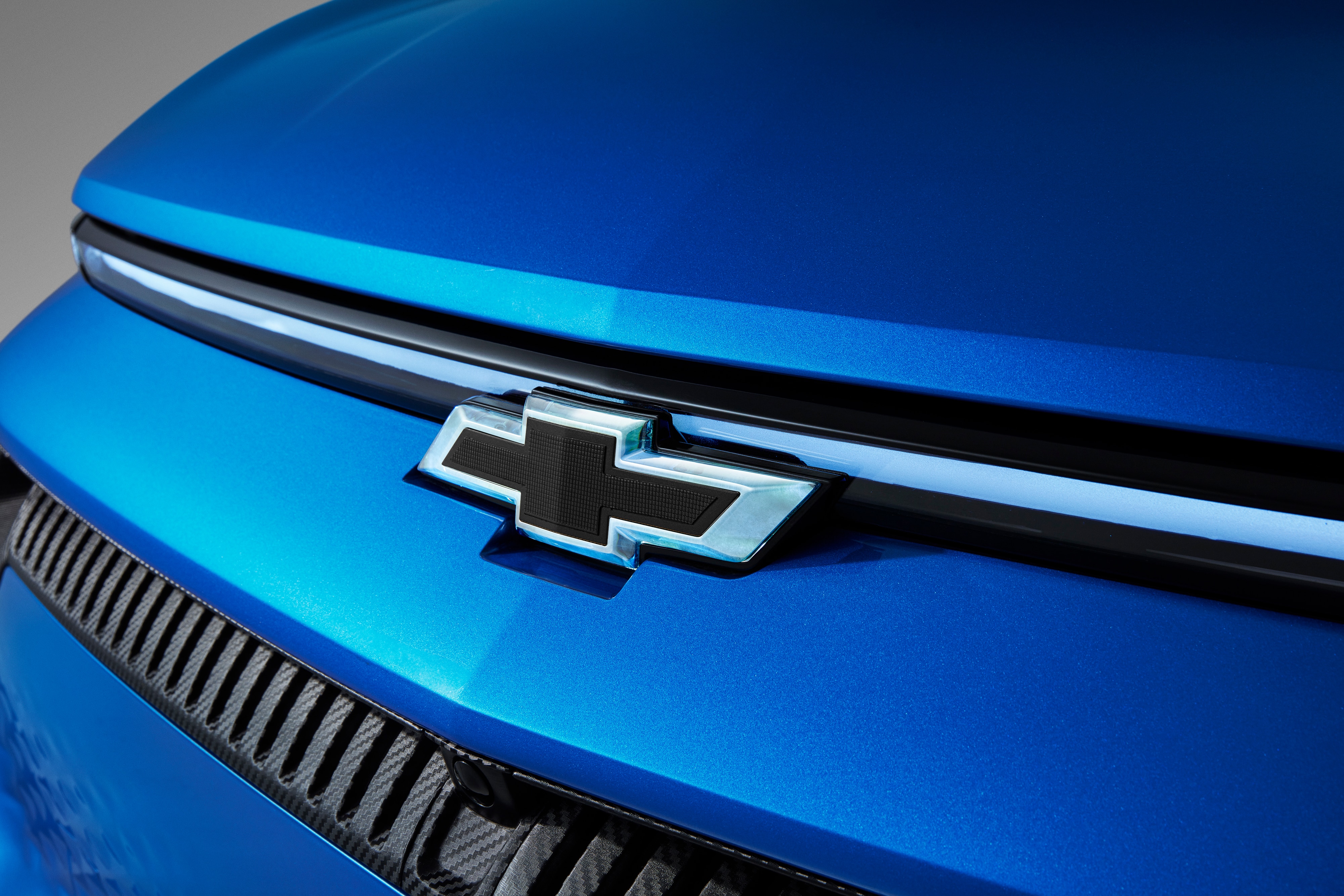Front Illuminated and Rear Non-Illuminated Bowtie Emblems in Black