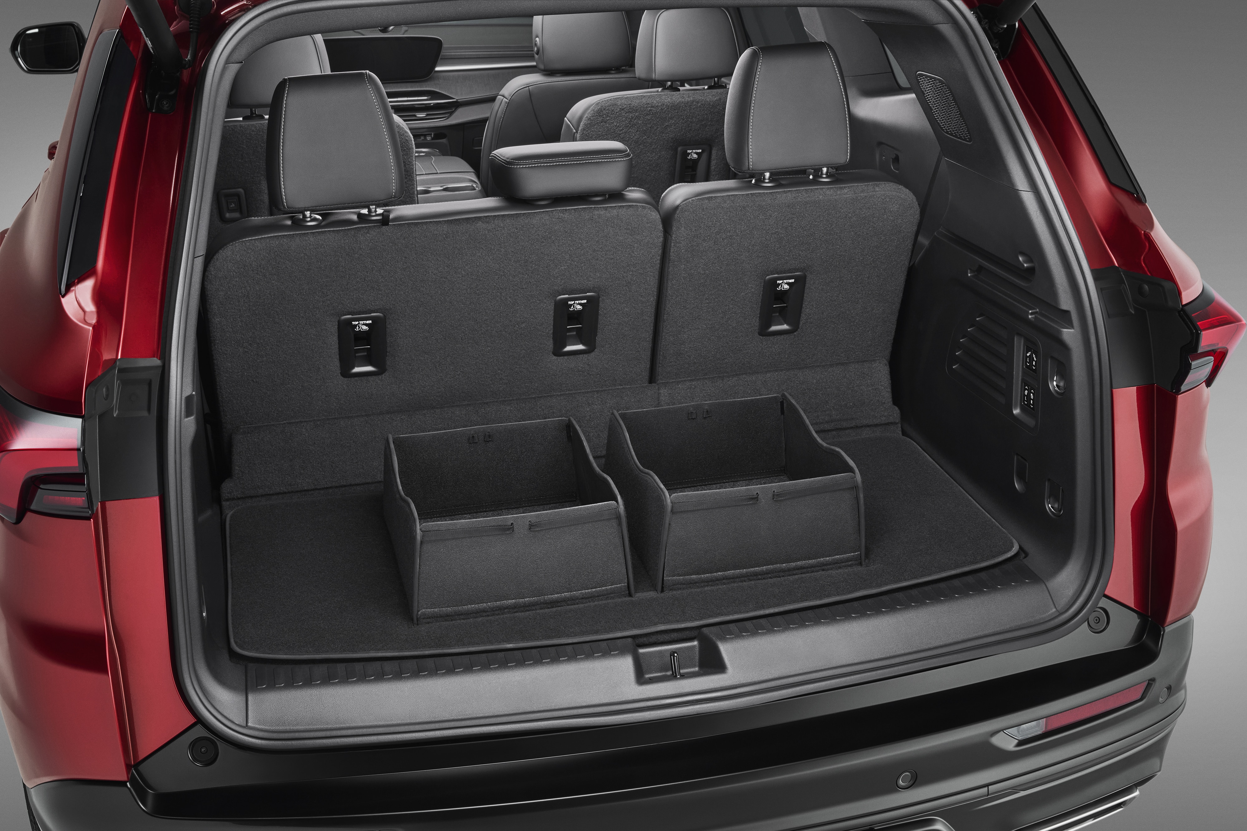 Premium Carpeted Cargo Area Mat in Black with Integrated Cargo Bins