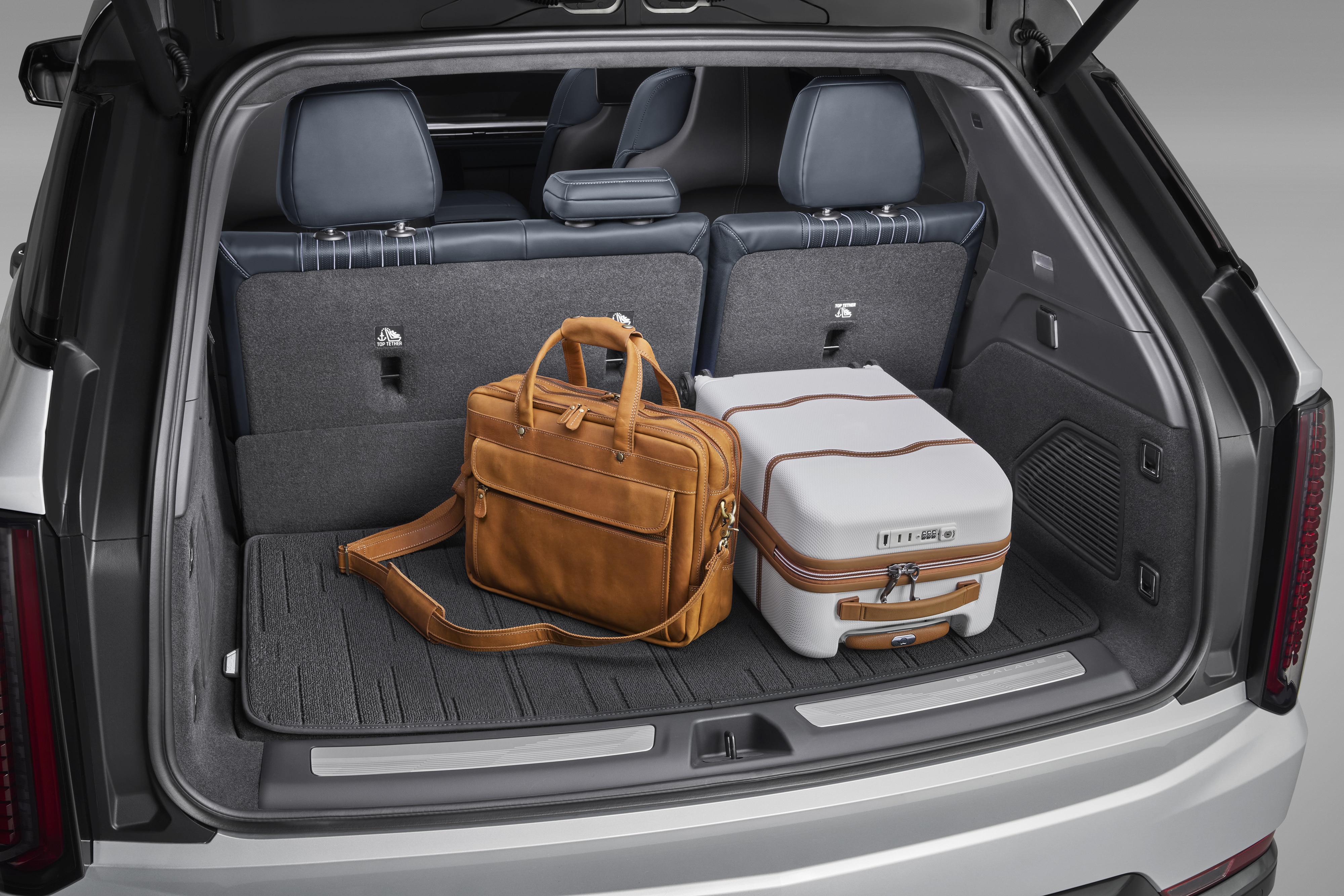 Premium Carpeted Cargo Area Mat in Backen Black with Cadillac Script