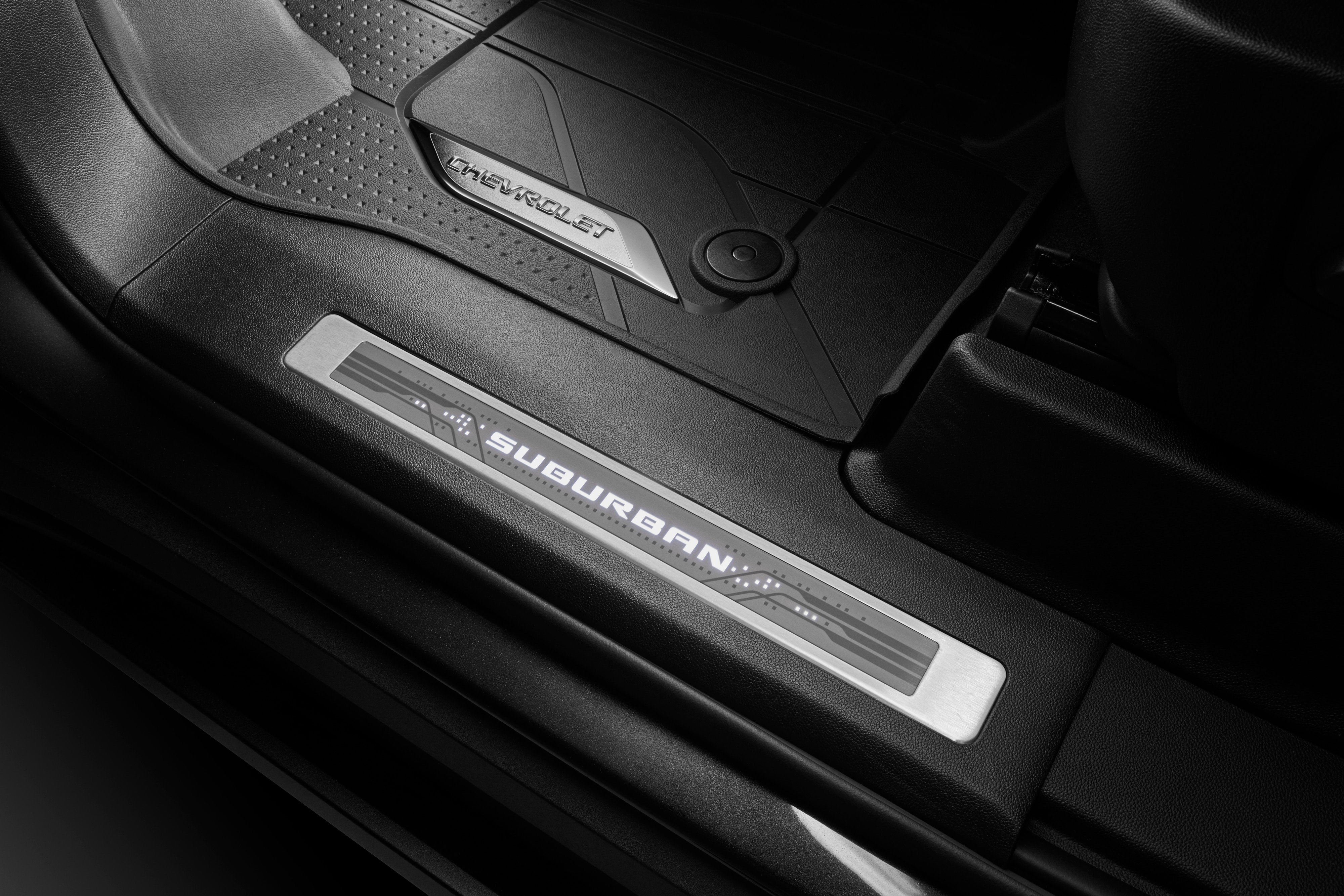 Illuminated Front and Rear Door Sill Plates with Suburban Script