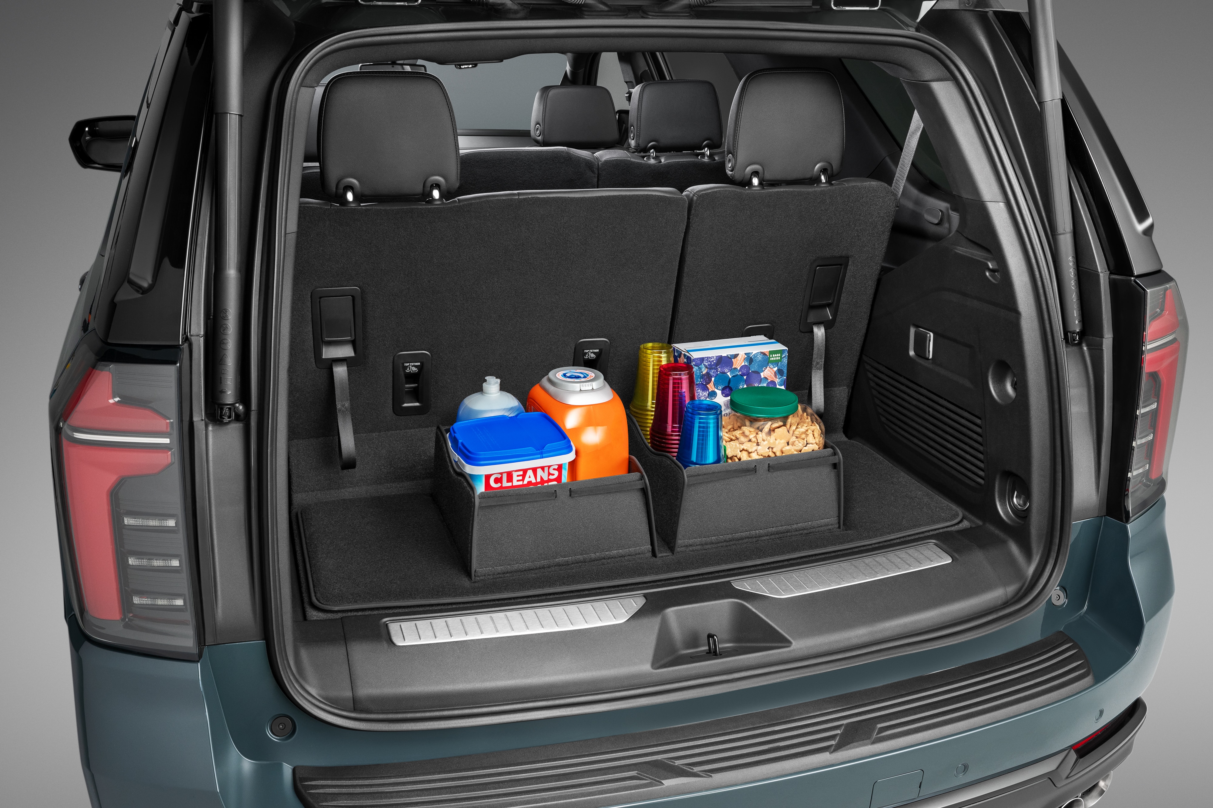 Premium Carpeted Cargo Area Mat in Jet Black with Integrated Cargo Bin