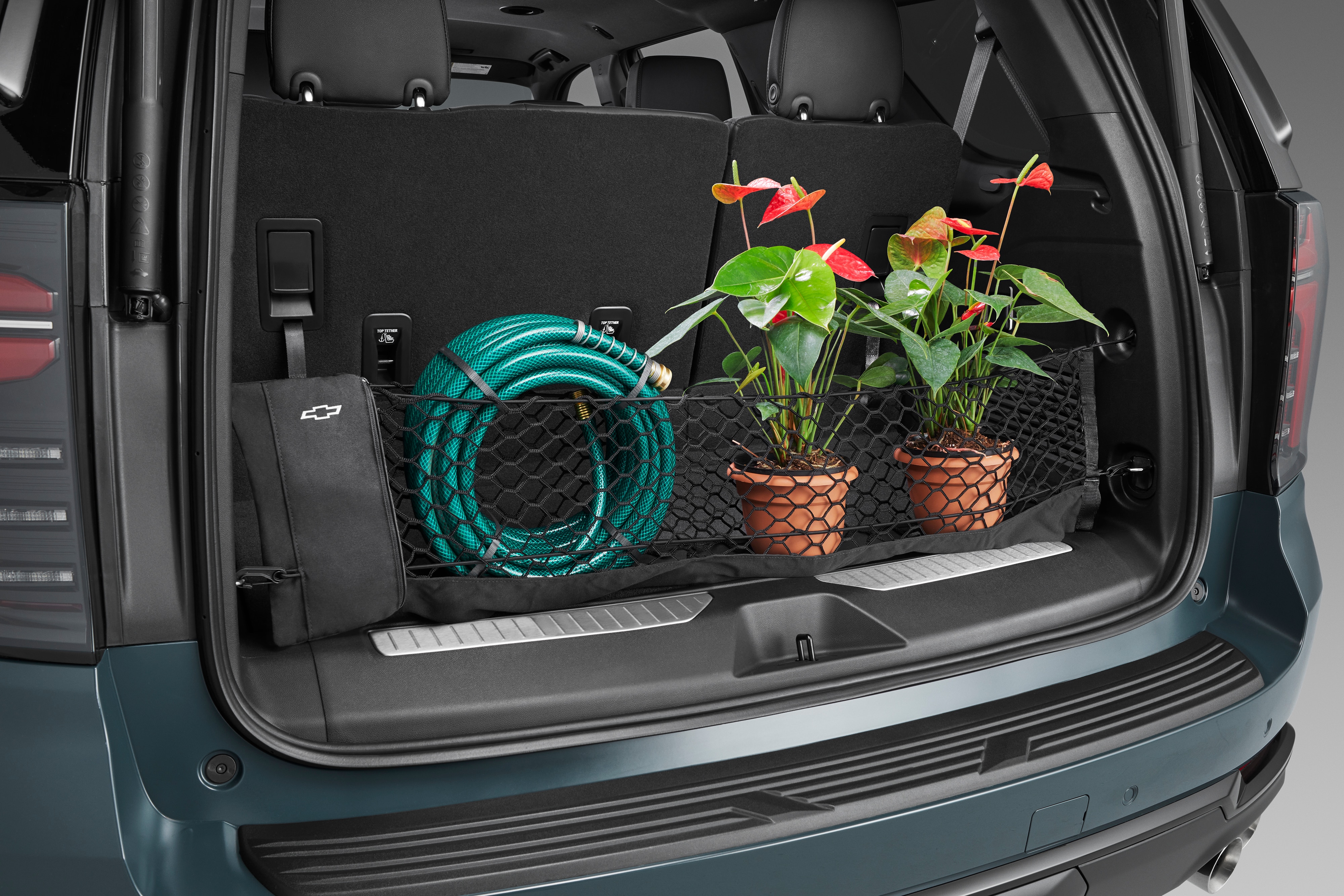 Vertical Cargo Net with Storage Bag featuring Bowtie Logo