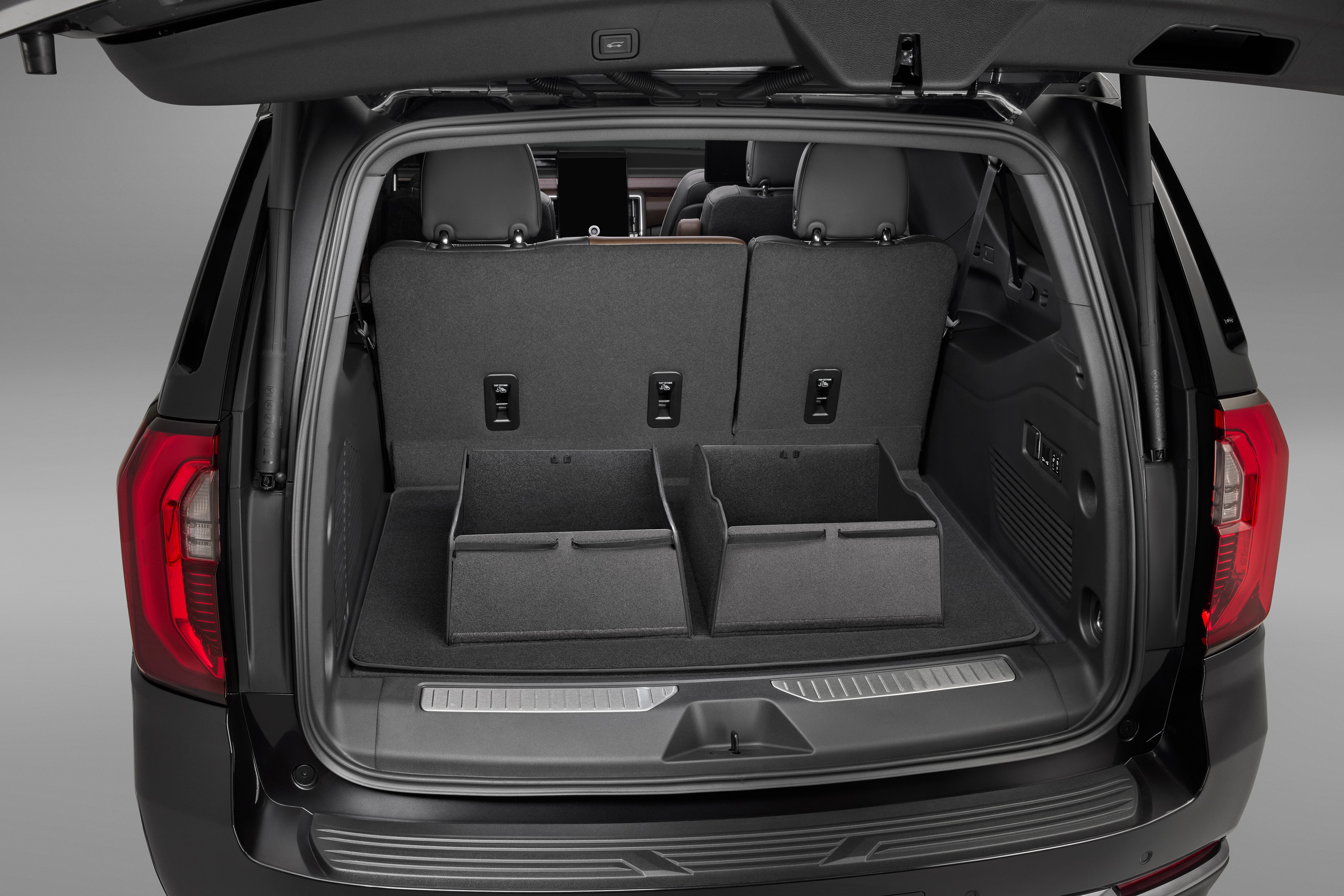 Premium Carpeted Cargo Area Mat in Jet Black with Integrated Cargo Bin