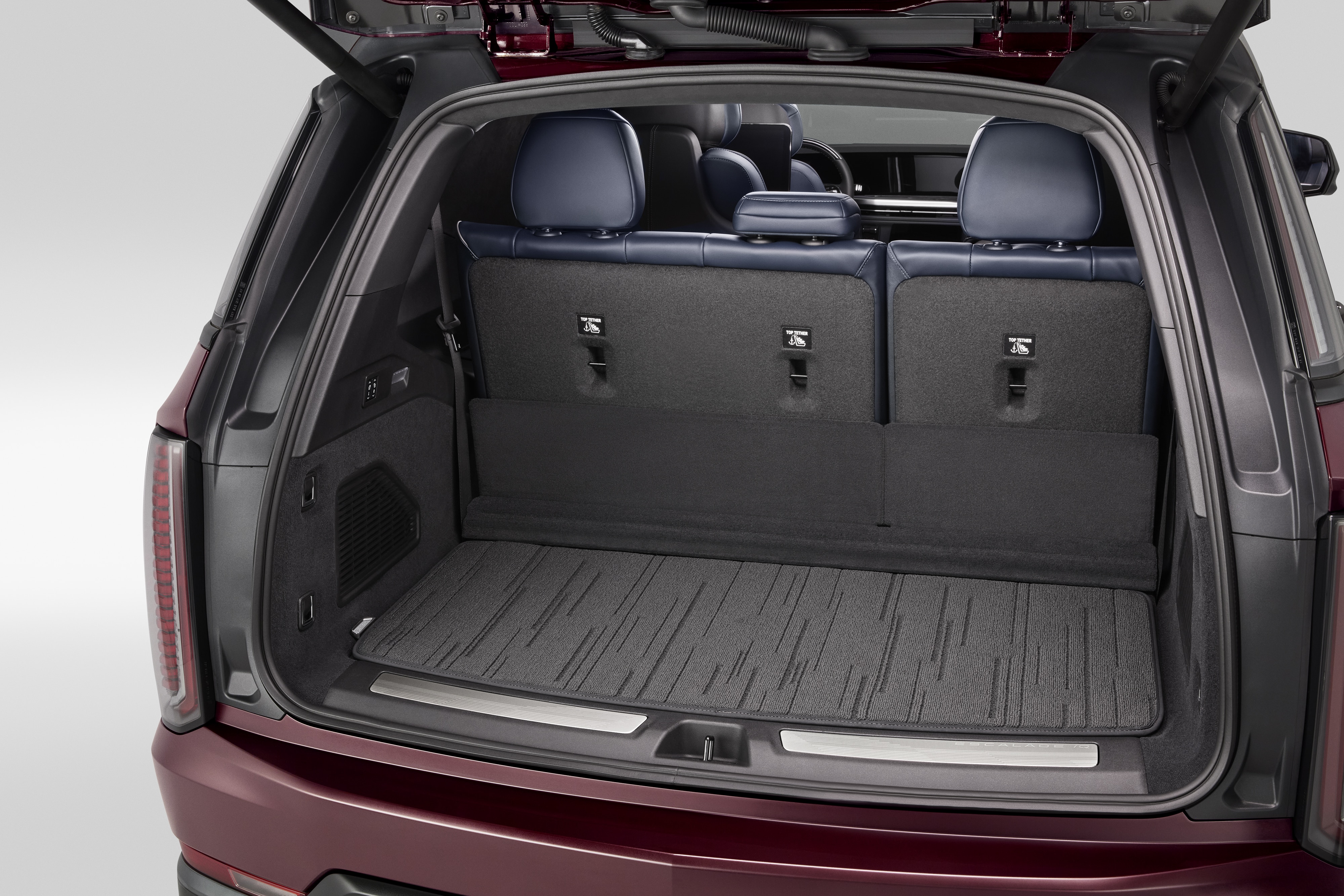 Premium Carpeted Cargo Area Mat in Backen Black with Cadillac Script