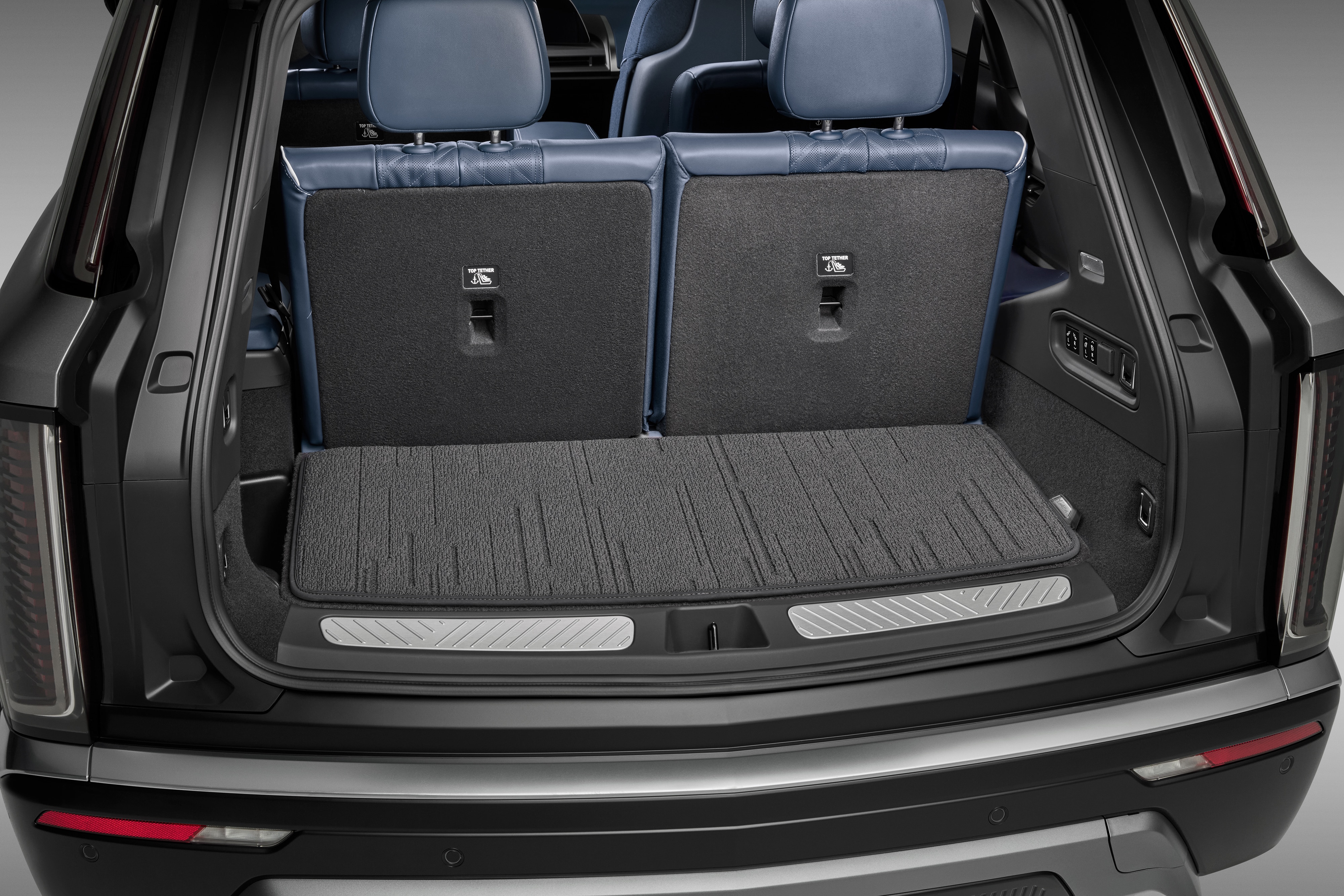 Premium Carpeted Cargo Area Mat in Jet Black with Cadillac Script