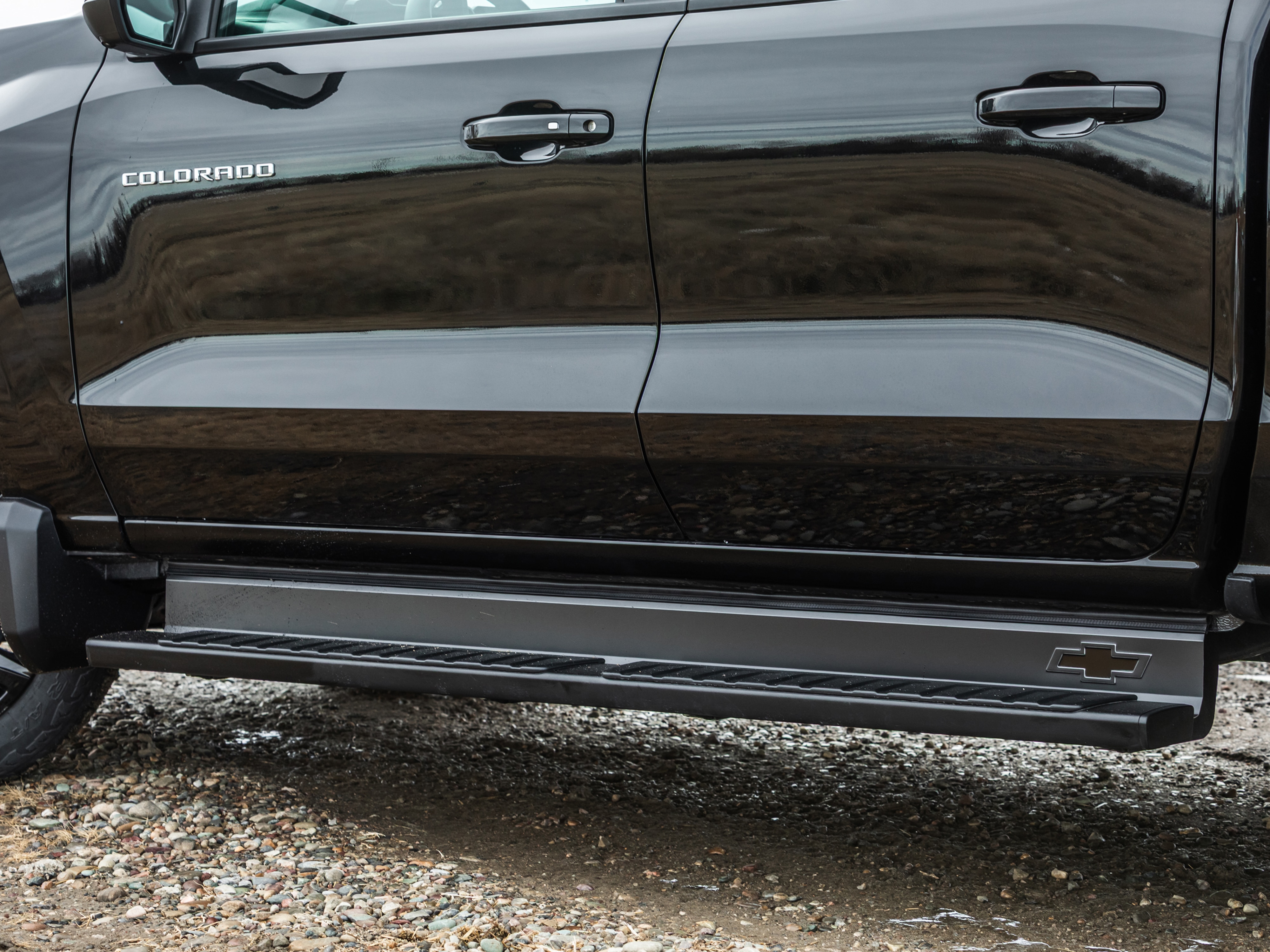 Assist Step Bar Fillers with Chevrolet Bowtie Logo in Black by Truck Hardware - Associated Accessories