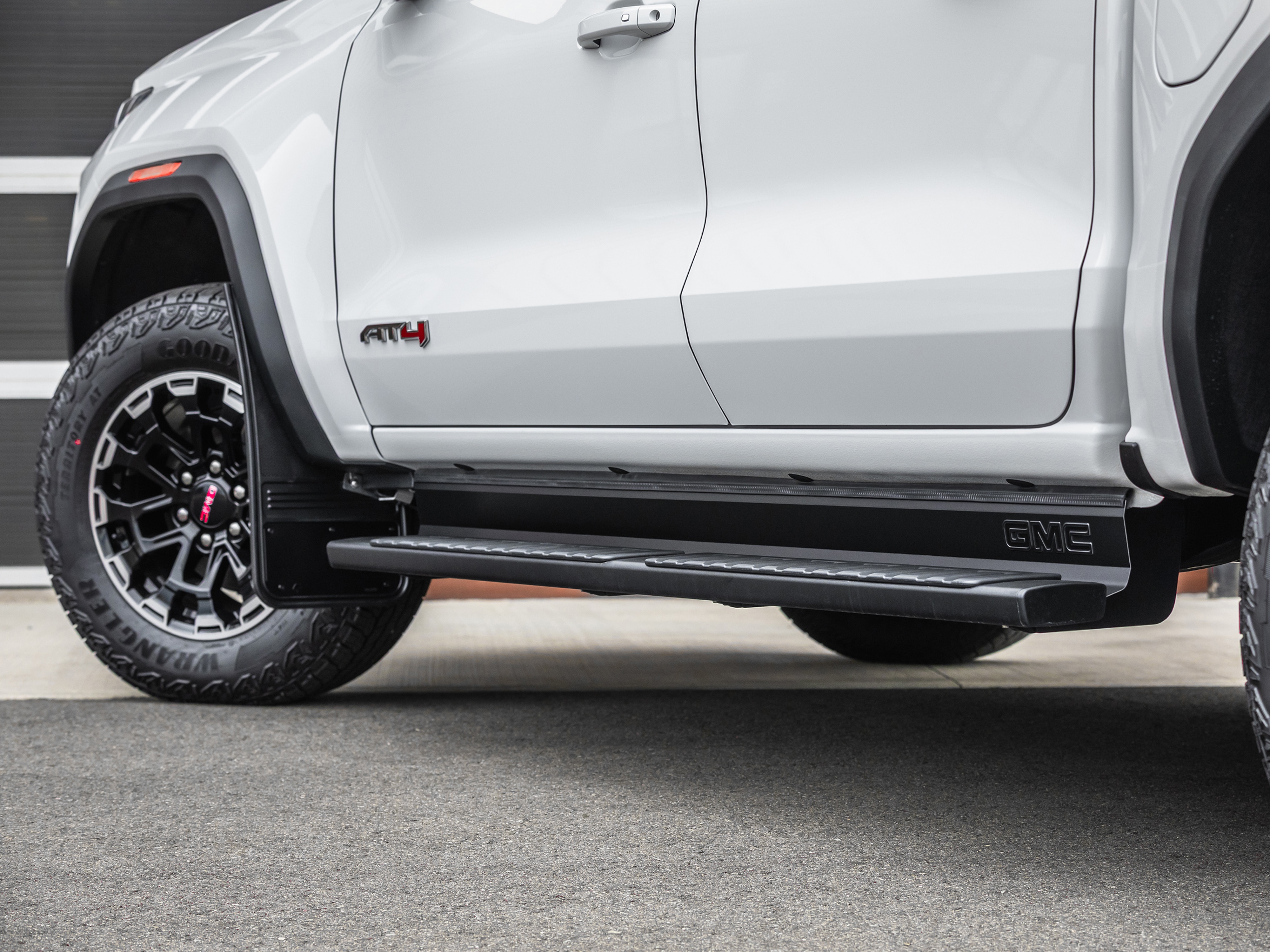 Assist Step Bar Fillers with GMC Logo in Black by Truck Hardware - Associated Accessories